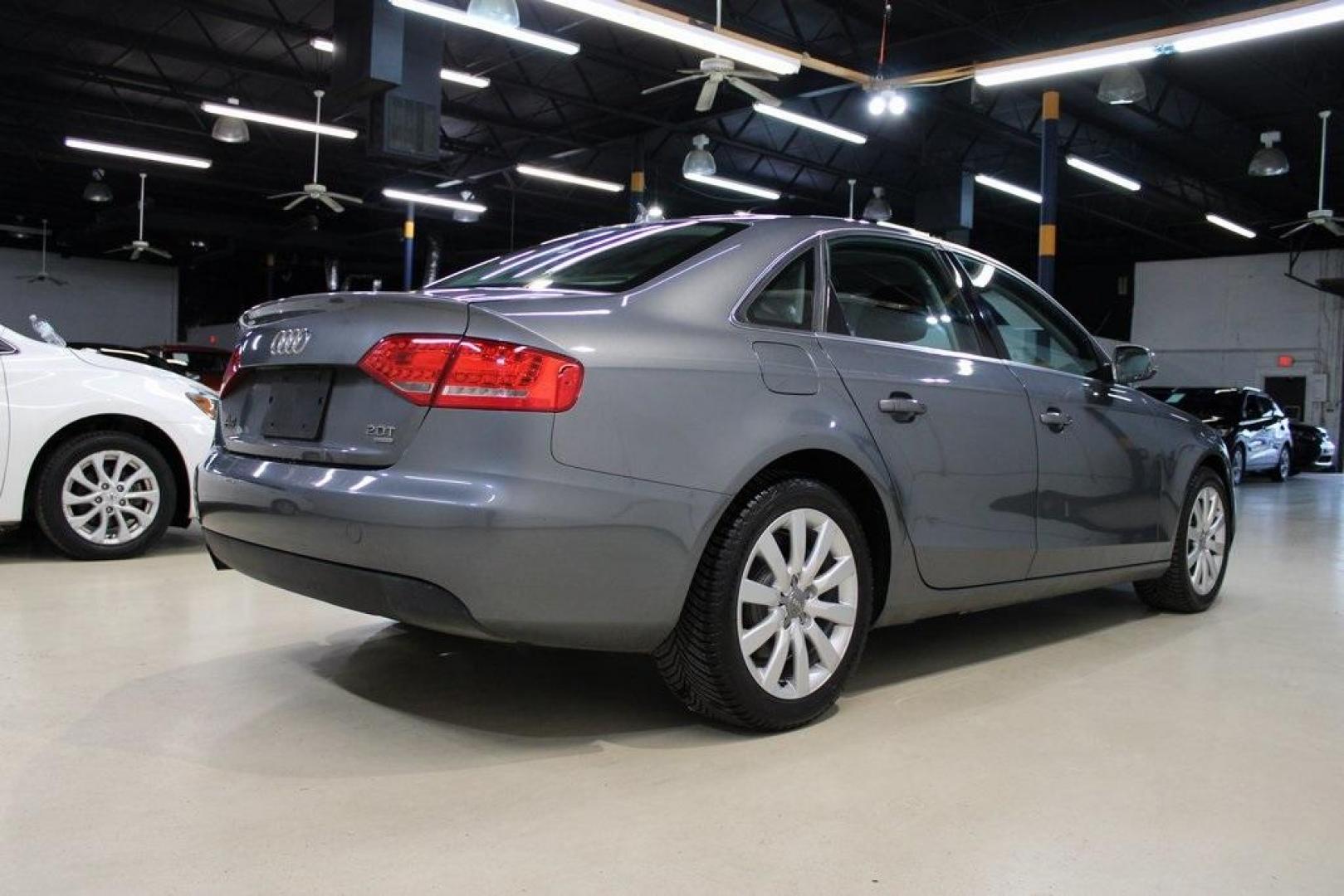 2012 Monsoon Gray Metallic /Black Audi A4 2.0T Premium (WAUBFAFL2CN) with an 2.0L 4-Cylinder TFSI DOHC engine, Automatic transmission, located at 15300 Midway Rd., Addison, TX, 75001, (972) 702-0011, 32.958321, -96.838074 - HOME OF THE NO HAGGLE PRICE - WHOLESALE PRICES TO THE PUBLIC!! A4 2.0T Premium quattro, 4D Sedan, 2.0L 4-Cylinder TFSI DOHC, 8-Speed Automatic with Tiptronic, quattro, Gray, Black Leather.<br><br>Gray 2012 Audi A4 2.0T Premium<br><br>Recent Arrival! 21/29 City/Highway MPG<br><br>Awards:<br> * 2012 - Photo#4