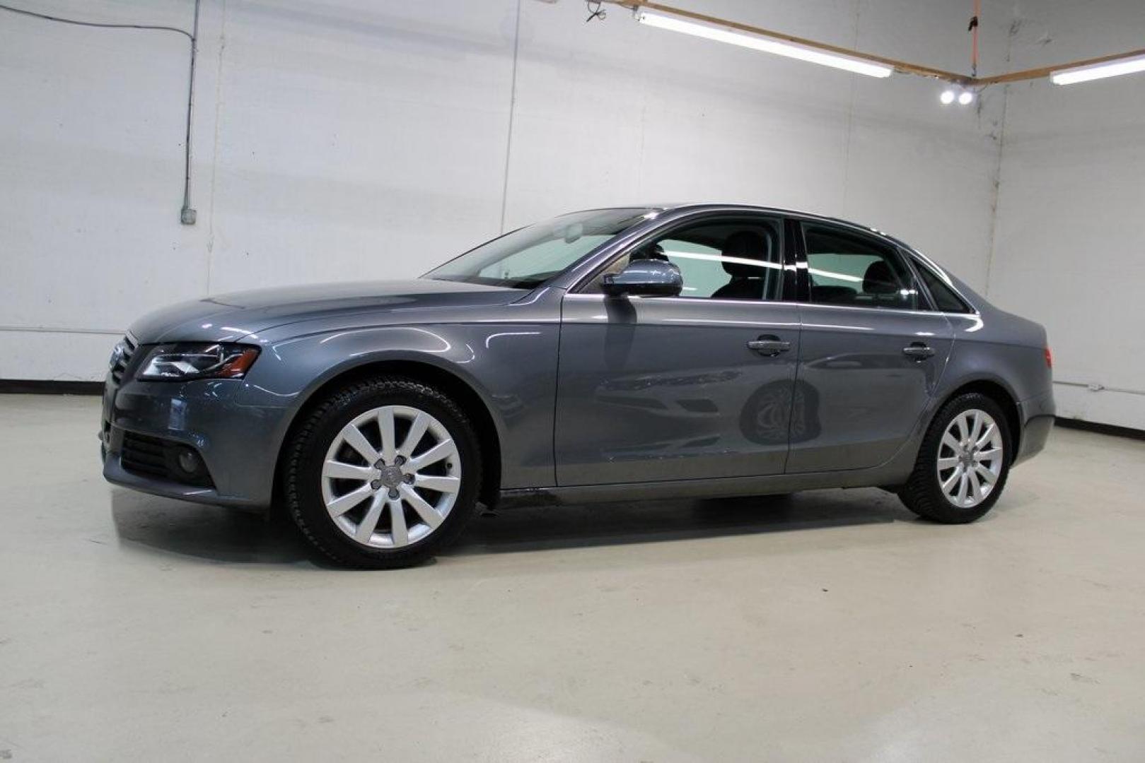 2012 Monsoon Gray Metallic /Black Audi A4 2.0T Premium (WAUBFAFL2CN) with an 2.0L 4-Cylinder TFSI DOHC engine, Automatic transmission, located at 15300 Midway Rd., Addison, TX, 75001, (972) 702-0011, 32.958321, -96.838074 - HOME OF THE NO HAGGLE PRICE - WHOLESALE PRICES TO THE PUBLIC!! A4 2.0T Premium quattro, 4D Sedan, 2.0L 4-Cylinder TFSI DOHC, 8-Speed Automatic with Tiptronic, quattro, Gray, Black Leather.<br><br>Gray 2012 Audi A4 2.0T Premium<br><br>Recent Arrival! 21/29 City/Highway MPG<br><br>Awards:<br> * 2012 - Photo#6