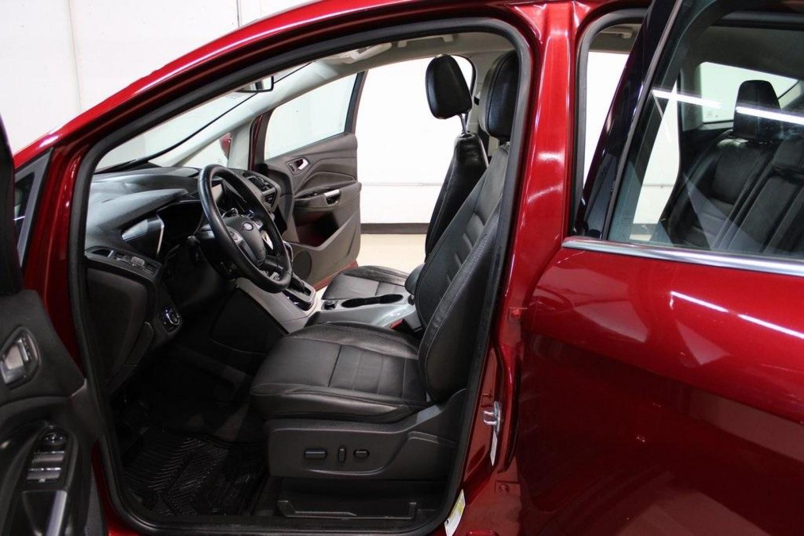 2014 Ruby Red Metallic Tinted Clearcoat /Charcoal Black Ford C-Max Energi SEL (1FADP5CU2EL) with an 2.0L I4 Atkinson-Cycle Hybrid engine, CVT transmission, located at 15300 Midway Rd., Addison, TX, 75001, (972) 702-0011, 32.958321, -96.838074 - HOME OF THE NO HAGGLE PRICE - WHOLESALE PRICES TO THE PUBLIC!! C-Max Energi SEL, 4D Hatchback, 2.0L I4 Atkinson-Cycle Hybrid, CVT, FWD, Red, Charcoal Black Leather.<br><br>Red 2014 Ford C-Max Energi SEL<br><br>Recent Arrival! 40/36 City/Highway MPG<br><br>Awards:<br> * 2014 KBB.com Brand Image Awar - Photo#11