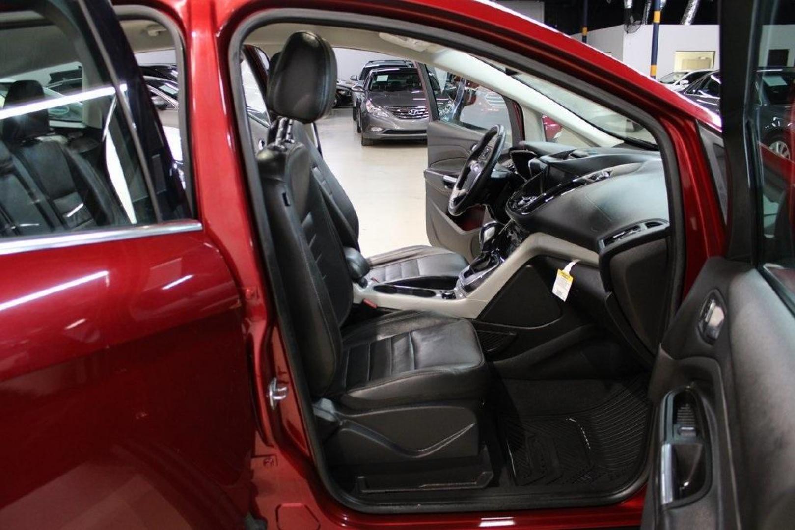 2014 Ruby Red Metallic Tinted Clearcoat /Charcoal Black Ford C-Max Energi SEL (1FADP5CU2EL) with an 2.0L I4 Atkinson-Cycle Hybrid engine, CVT transmission, located at 15300 Midway Rd., Addison, TX, 75001, (972) 702-0011, 32.958321, -96.838074 - HOME OF THE NO HAGGLE PRICE - WHOLESALE PRICES TO THE PUBLIC!! C-Max Energi SEL, 4D Hatchback, 2.0L I4 Atkinson-Cycle Hybrid, CVT, FWD, Red, Charcoal Black Leather.<br><br>Red 2014 Ford C-Max Energi SEL<br><br>Recent Arrival! 40/36 City/Highway MPG<br><br>Awards:<br> * 2014 KBB.com Brand Image Awar - Photo#12