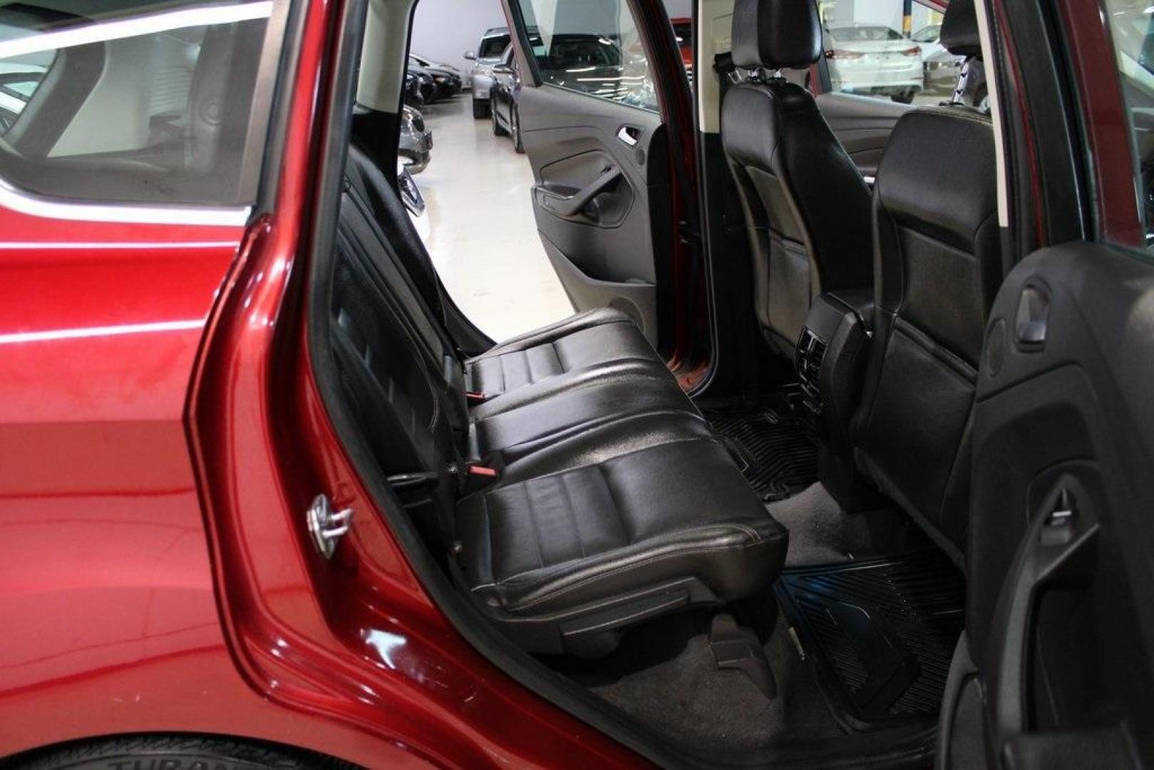 2014 Ruby Red Metallic Tinted Clearcoat /Charcoal Black Ford C-Max Energi SEL (1FADP5CU2EL) with an 2.0L I4 Atkinson-Cycle Hybrid engine, CVT transmission, located at 15300 Midway Rd., Addison, TX, 75001, (972) 702-0011, 32.958321, -96.838074 - HOME OF THE NO HAGGLE PRICE - WHOLESALE PRICES TO THE PUBLIC!! C-Max Energi SEL, 4D Hatchback, 2.0L I4 Atkinson-Cycle Hybrid, CVT, FWD, Red, Charcoal Black Leather.<br><br>Red 2014 Ford C-Max Energi SEL<br><br>Recent Arrival! 40/36 City/Highway MPG<br><br>Awards:<br> * 2014 KBB.com Brand Image Awar - Photo#13