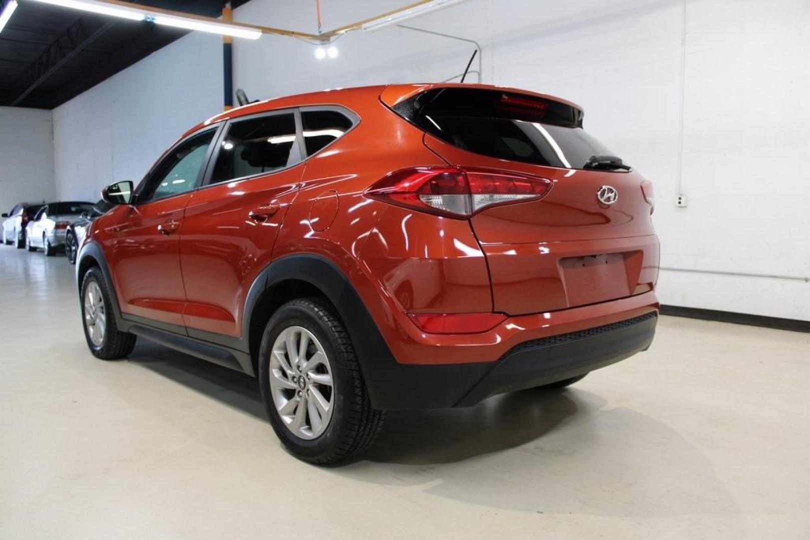 2017 Sedona Sunset /Black Hyundai Tucson SE (KM8J23A44HU) with an 2.0L DOHC engine, Automatic transmission, located at 15300 Midway Rd., Addison, TX, 75001, (972) 702-0011, 32.958321, -96.838074 - HOME OF THE NO HAGGLE PRICE - WHOLESALE PRICES TO THE PUBLIC!! Tucson SE, 4D Sport Utility, 2.0L DOHC, 6-Speed Automatic with Shiftronic, FWD, Sedona Sunset, Black Cloth.<br><br>Sedona Sunset 2017 Hyundai Tucson SE<br><br>23/30 City/Highway MPG<br><br>Awards:<br> * 2017 KBB.com 10 Best SUVs Under $ - Photo#3