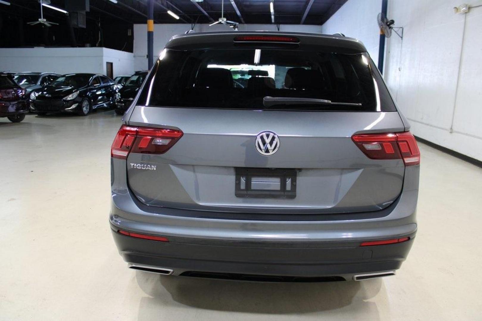 2019 Platinum Gray Metallic /Storm Gray Volkswagen Tiguan 2.0T S (3VV1B7AX2KM) with an 2.0L TSI DOHC engine, Automatic transmission, located at 15300 Midway Rd., Addison, TX, 75001, (972) 702-0011, 32.958321, -96.838074 - HOME OF THE NO HAGGLE PRICE - WHOLESALE PRICES TO THE PUBLIC!! non smoker, Tiguan 2.0T S, 4D Sport Utility, 2.0L TSI DOHC, 8-Speed Automatic with Tiptronic, FWD, Gray, Storm Gray Cloth.<br><br>Gray 2019 Volkswagen Tiguan 2.0T S<br><br>Recent Arrival! 22/29 City/Highway MPG<br><br><br>At Midway Auto - Photo#4