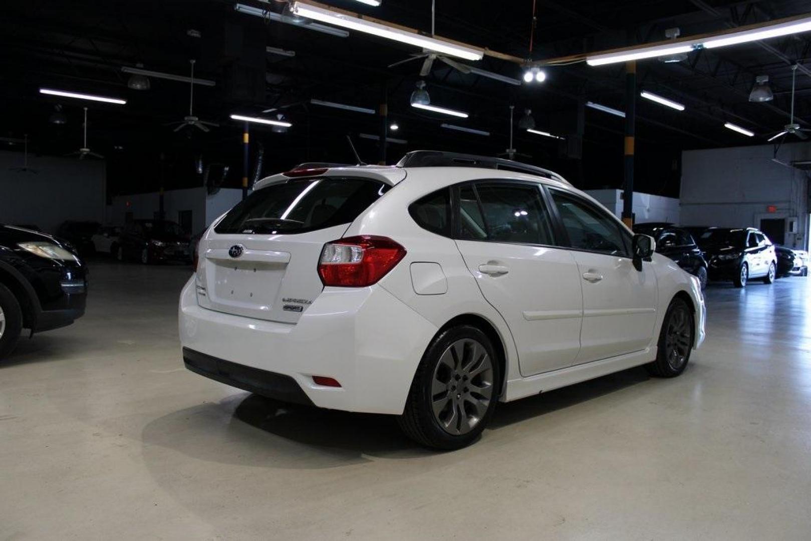 2012 Satin White Pearl /Ivory Subaru Impreza 2.0i Sport Limited (JF1GPAS63CH) with an 2.0L DOHC engine, CVT transmission, located at 15300 Midway Rd., Addison, TX, 75001, (972) 702-0011, 32.958321, -96.838074 - Photo#2