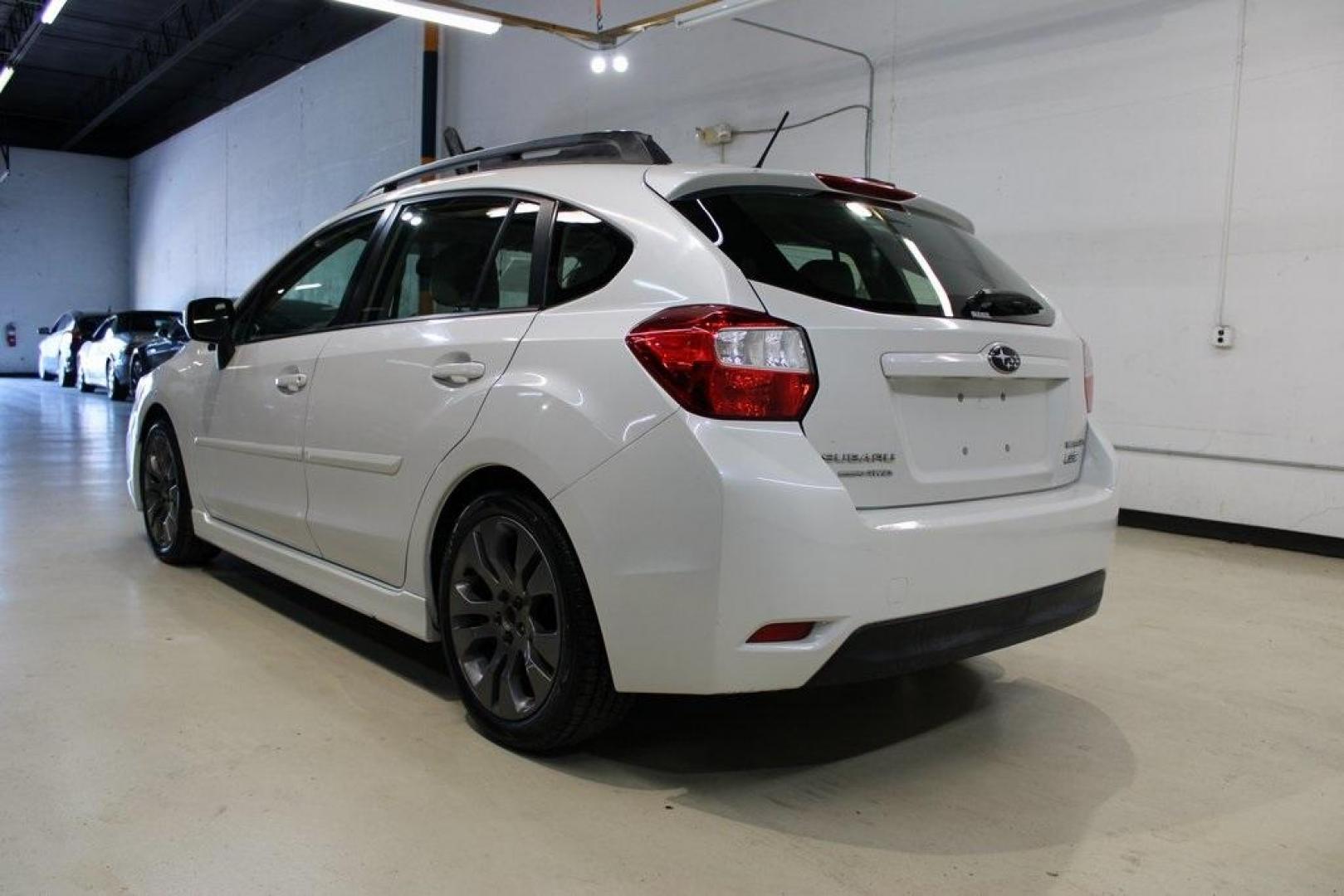 2012 Satin White Pearl /Ivory Subaru Impreza 2.0i Sport Limited (JF1GPAS63CH) with an 2.0L DOHC engine, CVT transmission, located at 15300 Midway Rd., Addison, TX, 75001, (972) 702-0011, 32.958321, -96.838074 - Photo#3