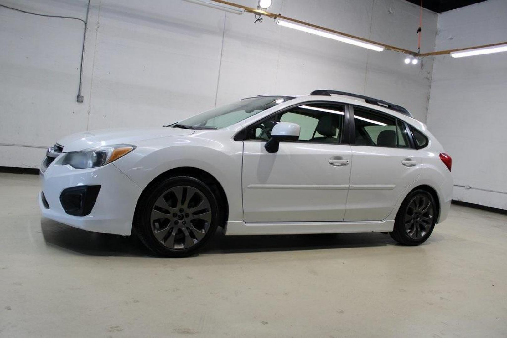 2012 Satin White Pearl /Ivory Subaru Impreza 2.0i Sport Limited (JF1GPAS63CH) with an 2.0L DOHC engine, CVT transmission, located at 15300 Midway Rd., Addison, TX, 75001, (972) 702-0011, 32.958321, -96.838074 - Photo#4