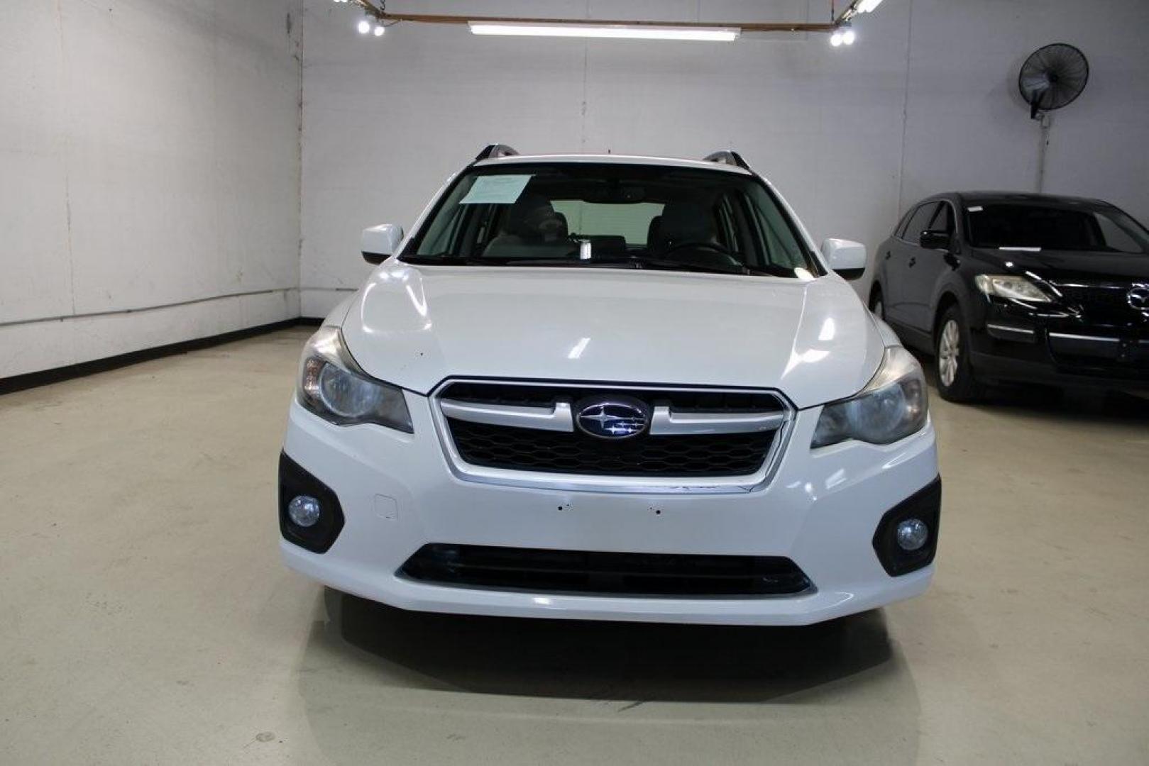 2012 Satin White Pearl /Ivory Subaru Impreza 2.0i Sport Limited (JF1GPAS63CH) with an 2.0L DOHC engine, CVT transmission, located at 15300 Midway Rd., Addison, TX, 75001, (972) 702-0011, 32.958321, -96.838074 - Photo#5