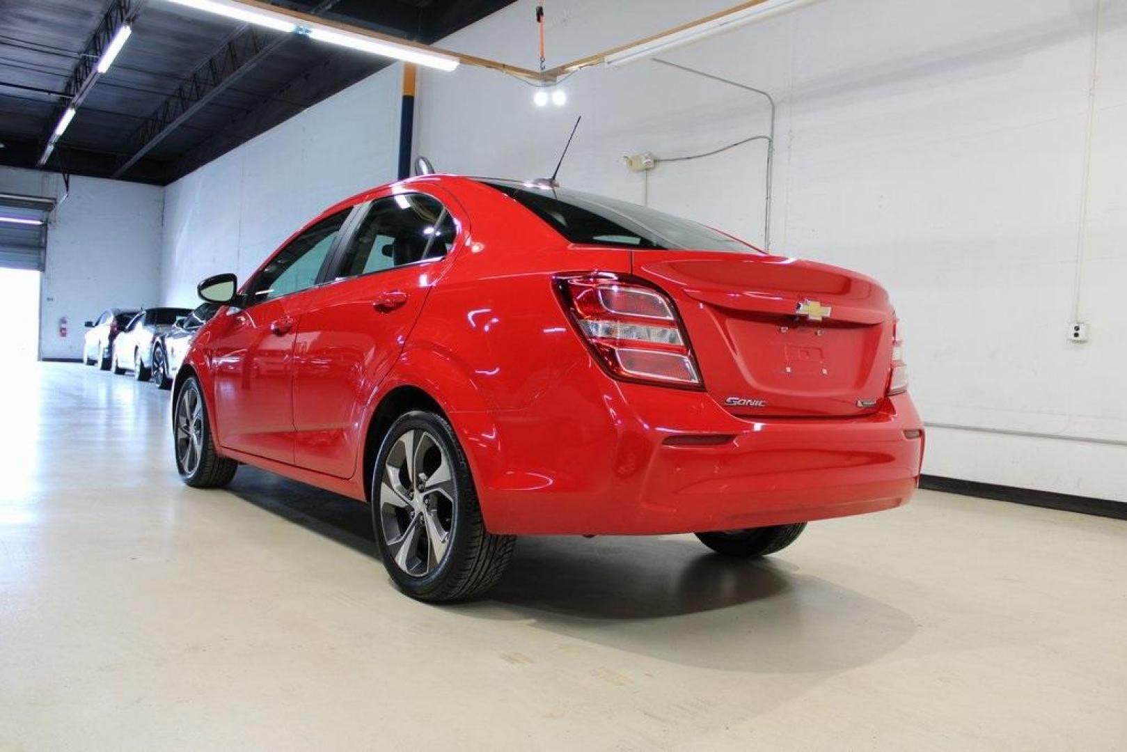 2020 Red Hot /Jet Black/Dark Titanium Chevrolet Sonic Premier (1G1JF5SB3L4) with an I4 engine, Automatic transmission, located at 15300 Midway Rd., Addison, TX, 75001, (972) 702-0011, 32.958321, -96.838074 - HOME OF THE NO HAGGLE PRICE - WHOLESALE PRICES TO THE PUBLIC!! Sonic Premier, 4D Sedan, I4, 6-Speed Automatic, FWD, Red Hot, Jet Black/Dark Titanium Artificial Leather.<br><br>Red Hot 2020 Chevrolet Sonic Premier<br><br>26/34 City/Highway MPG<br><br>Awards:<br> * JD Power Initial Quality Study<br>< - Photo#3