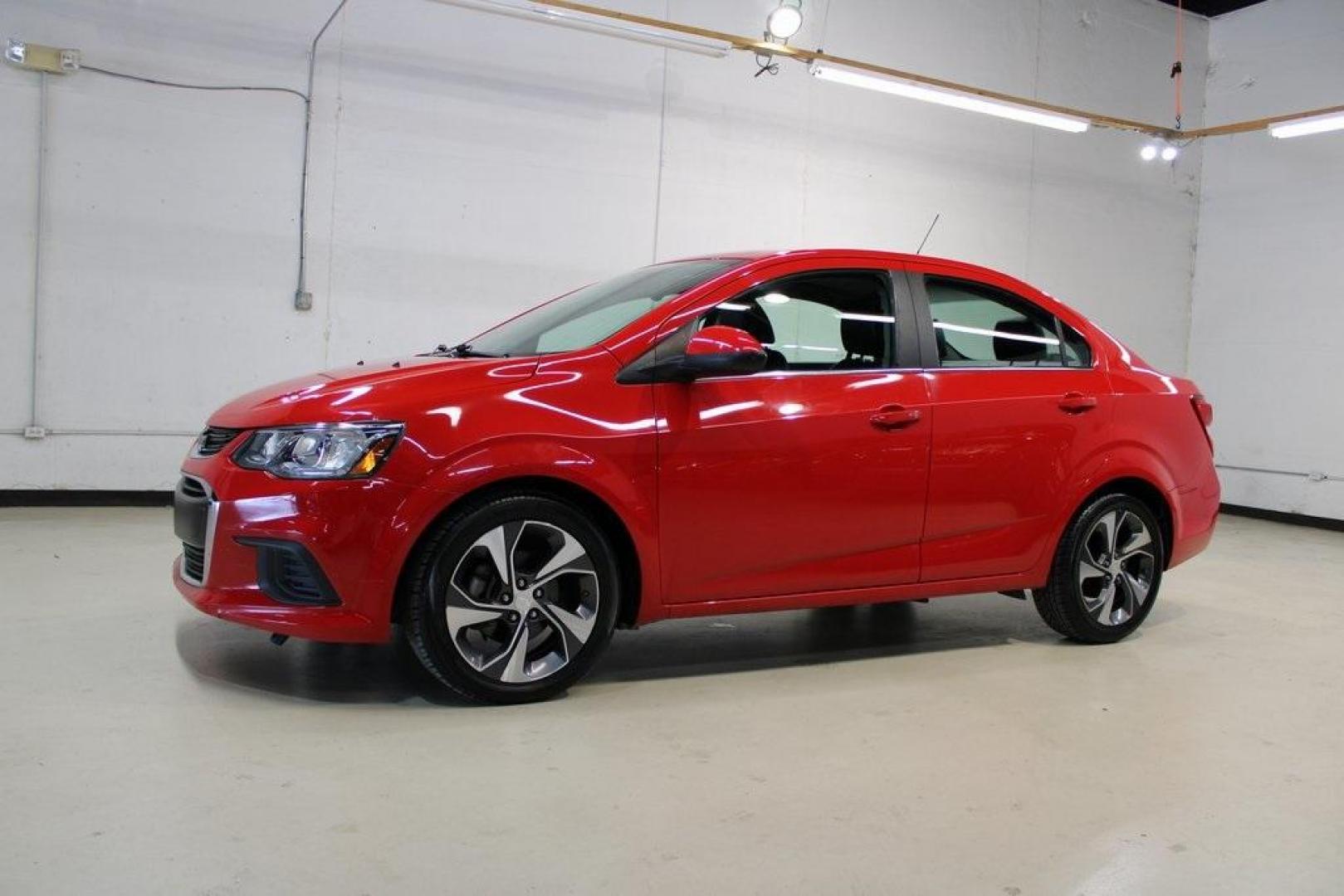 2020 Red Hot /Jet Black/Dark Titanium Chevrolet Sonic Premier (1G1JF5SB3L4) with an I4 engine, Automatic transmission, located at 15300 Midway Rd., Addison, TX, 75001, (972) 702-0011, 32.958321, -96.838074 - HOME OF THE NO HAGGLE PRICE - WHOLESALE PRICES TO THE PUBLIC!! Sonic Premier, 4D Sedan, I4, 6-Speed Automatic, FWD, Red Hot, Jet Black/Dark Titanium Artificial Leather.<br><br>Red Hot 2020 Chevrolet Sonic Premier<br><br>26/34 City/Highway MPG<br><br>Awards:<br> * JD Power Initial Quality Study<br>< - Photo#4