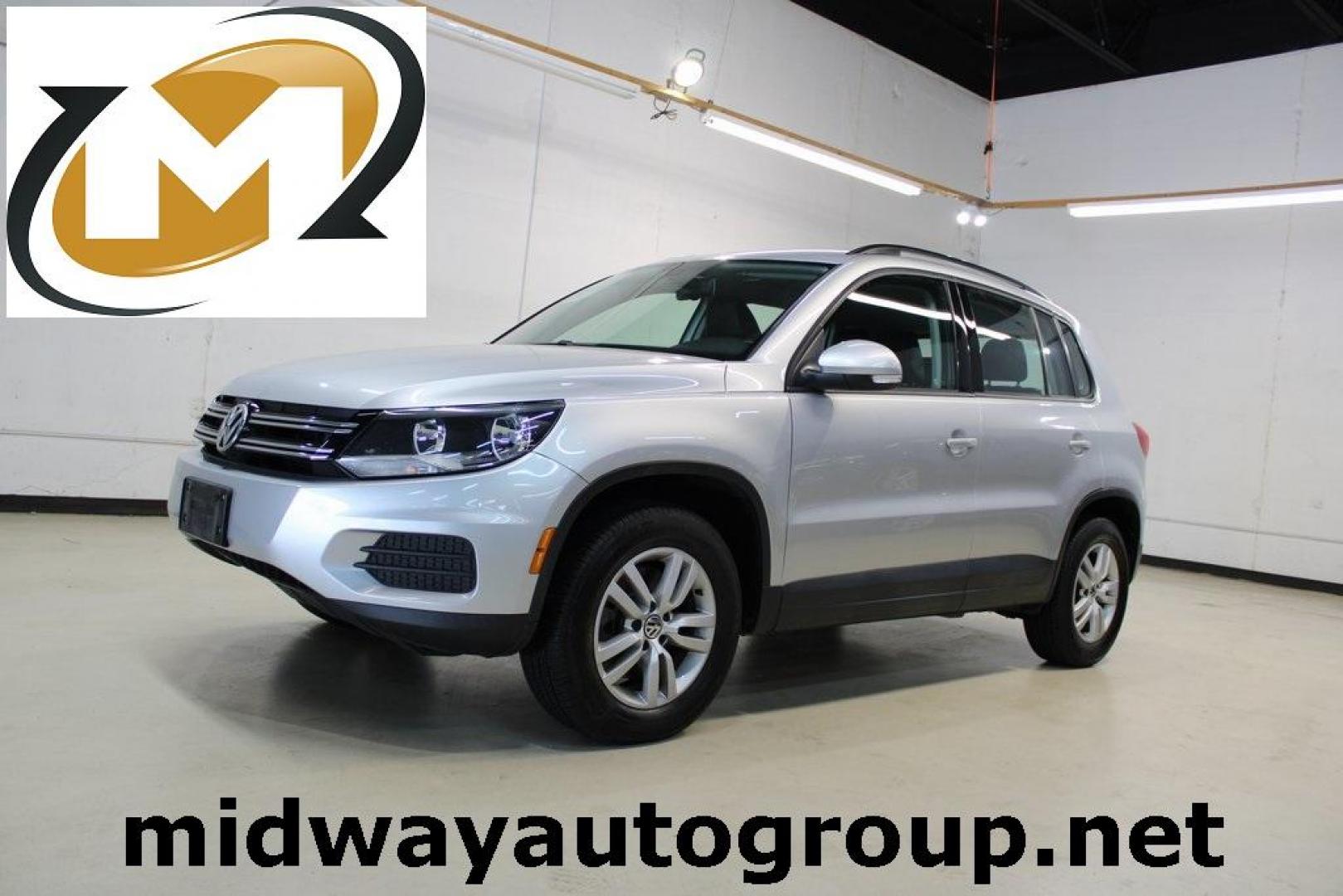 2017 Reflex Silver Metallic /Charcoal Black Volkswagen Tiguan 2.0T S (WVGAV7AX3HK) with an 2.0L TSI DOHC engine, Automatic transmission, located at 15300 Midway Rd., Addison, TX, 75001, (972) 702-0011, 32.958321, -96.838074 - HOME OF THE NO HAGGLE PRICE - WHOLESALE PRICES TO THE PUBLIC!! Tiguan 2.0T S, 4D Sport Utility, 2.0L TSI DOHC, 6-Speed Automatic with Tiptronic, FWD, Silver.<br><br>Silver 2017 Volkswagen Tiguan 2.0T S<br><br><br>At Midway Auto Group, we strive to provide you with the best quality vehicles for the l - Photo#0