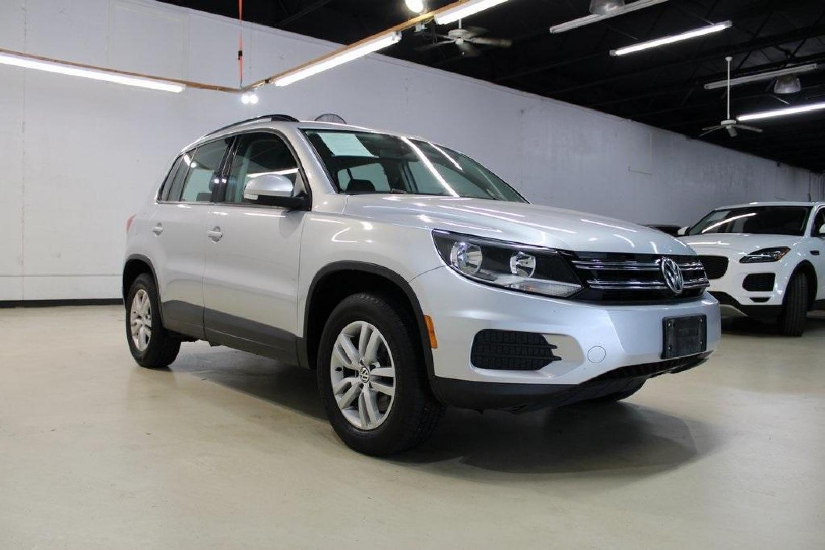 2017 Reflex Silver Metallic /Charcoal Black Volkswagen Tiguan 2.0T S (WVGAV7AX3HK) with an 2.0L TSI DOHC engine, Automatic transmission, located at 15300 Midway Rd., Addison, TX, 75001, (972) 702-0011, 32.958321, -96.838074 - HOME OF THE NO HAGGLE PRICE - WHOLESALE PRICES TO THE PUBLIC!! Tiguan 2.0T S, 4D Sport Utility, 2.0L TSI DOHC, 6-Speed Automatic with Tiptronic, FWD, Silver.<br><br>Silver 2017 Volkswagen Tiguan 2.0T S<br><br><br>At Midway Auto Group, we strive to provide you with the best quality vehicles for the l - Photo#1