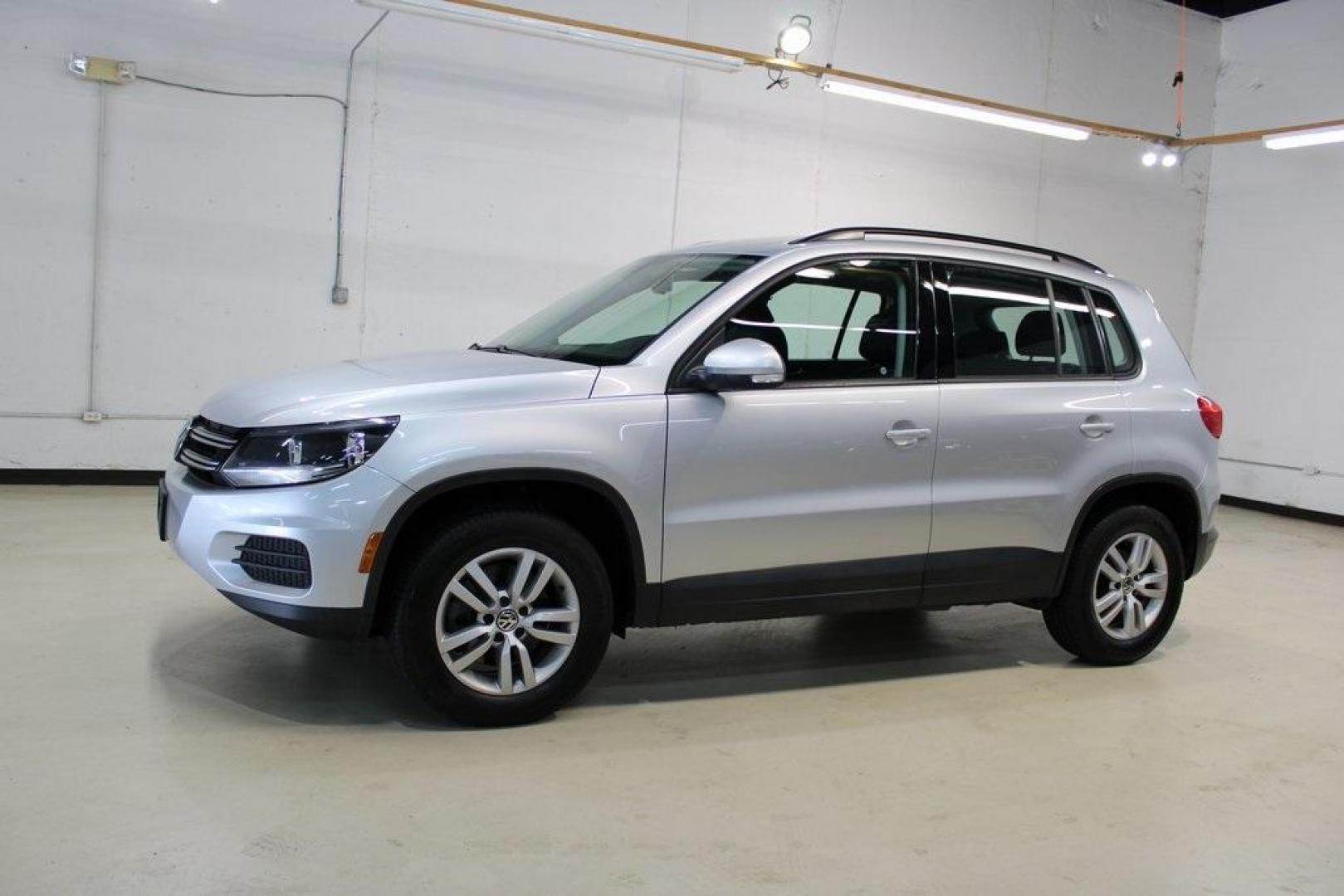 2017 Reflex Silver Metallic /Charcoal Black Volkswagen Tiguan 2.0T S (WVGAV7AX3HK) with an 2.0L TSI DOHC engine, Automatic transmission, located at 15300 Midway Rd., Addison, TX, 75001, (972) 702-0011, 32.958321, -96.838074 - HOME OF THE NO HAGGLE PRICE - WHOLESALE PRICES TO THE PUBLIC!! Tiguan 2.0T S, 4D Sport Utility, 2.0L TSI DOHC, 6-Speed Automatic with Tiptronic, FWD, Silver.<br><br>Silver 2017 Volkswagen Tiguan 2.0T S<br><br><br>At Midway Auto Group, we strive to provide you with the best quality vehicles for the l - Photo#4