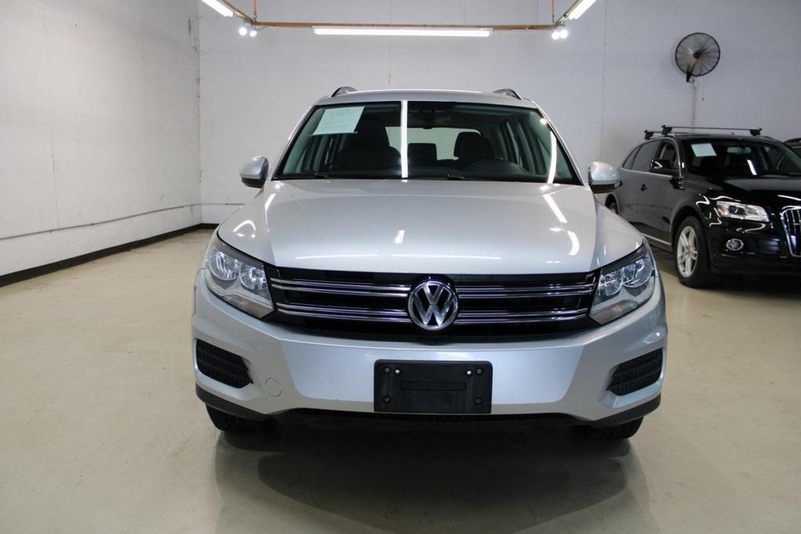 2017 Reflex Silver Metallic /Charcoal Black Volkswagen Tiguan 2.0T S (WVGAV7AX3HK) with an 2.0L TSI DOHC engine, Automatic transmission, located at 15300 Midway Rd., Addison, TX, 75001, (972) 702-0011, 32.958321, -96.838074 - HOME OF THE NO HAGGLE PRICE - WHOLESALE PRICES TO THE PUBLIC!! Tiguan 2.0T S, 4D Sport Utility, 2.0L TSI DOHC, 6-Speed Automatic with Tiptronic, FWD, Silver.<br><br>Silver 2017 Volkswagen Tiguan 2.0T S<br><br><br>At Midway Auto Group, we strive to provide you with the best quality vehicles for the l - Photo#5