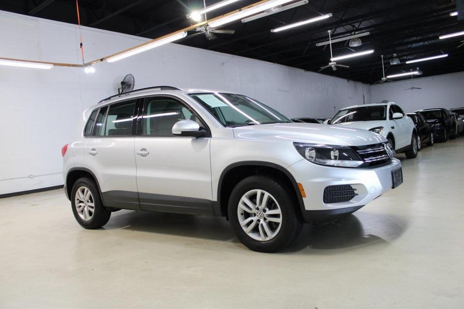 2017 Reflex Silver Metallic /Charcoal Black Volkswagen Tiguan 2.0T S (WVGAV7AX3HK) with an 2.0L TSI DOHC engine, Automatic transmission, located at 15300 Midway Rd., Addison, TX, 75001, (972) 702-0011, 32.958321, -96.838074 - HOME OF THE NO HAGGLE PRICE - WHOLESALE PRICES TO THE PUBLIC!! Tiguan 2.0T S, 4D Sport Utility, 2.0L TSI DOHC, 6-Speed Automatic with Tiptronic, FWD, Silver.<br><br>Silver 2017 Volkswagen Tiguan 2.0T S<br><br><br>At Midway Auto Group, we strive to provide you with the best quality vehicles for the l - Photo#6