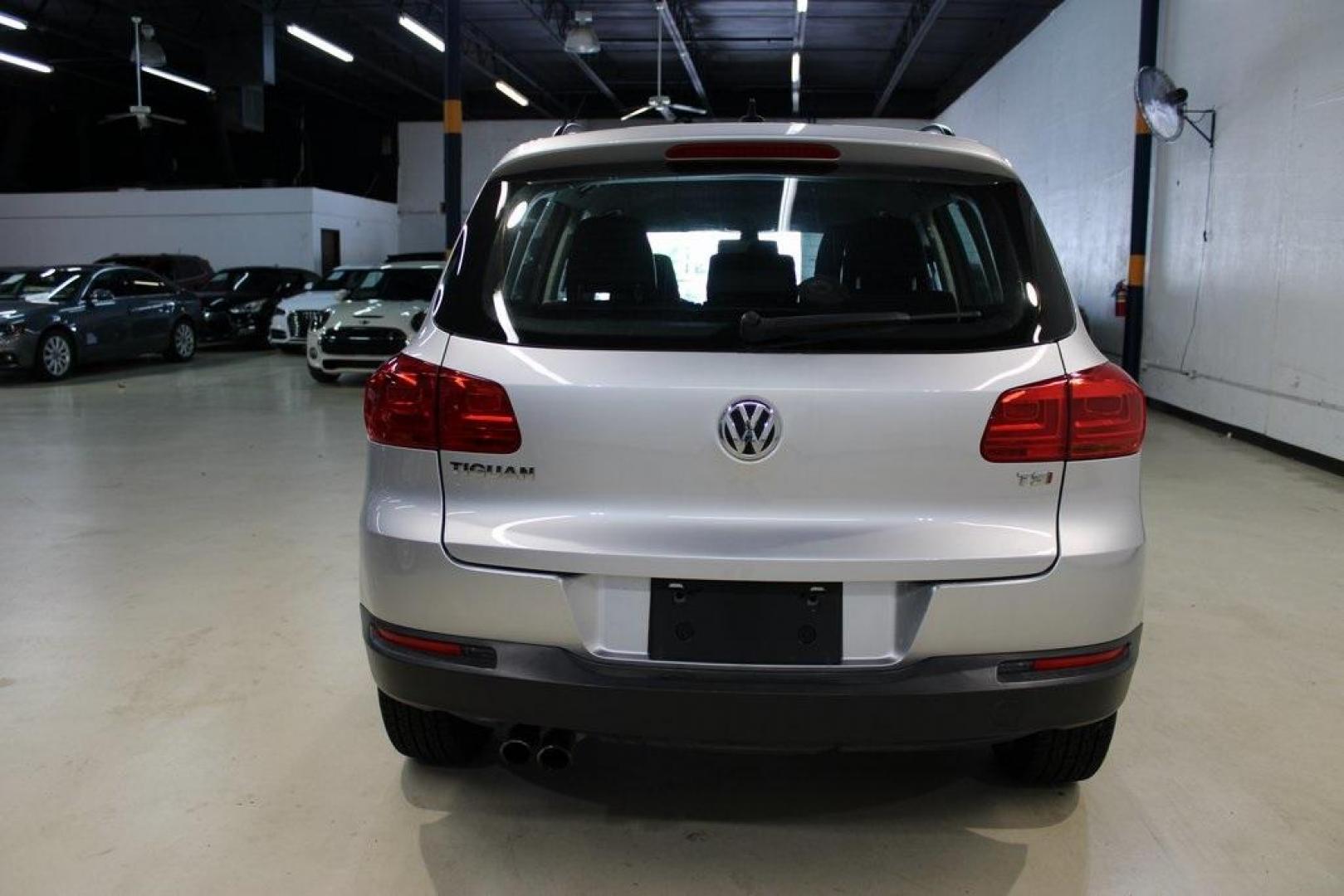 2017 Reflex Silver Metallic /Charcoal Black Volkswagen Tiguan 2.0T S (WVGAV7AX3HK) with an 2.0L TSI DOHC engine, Automatic transmission, located at 15300 Midway Rd., Addison, TX, 75001, (972) 702-0011, 32.958321, -96.838074 - HOME OF THE NO HAGGLE PRICE - WHOLESALE PRICES TO THE PUBLIC!! Tiguan 2.0T S, 4D Sport Utility, 2.0L TSI DOHC, 6-Speed Automatic with Tiptronic, FWD, Silver.<br><br>Silver 2017 Volkswagen Tiguan 2.0T S<br><br><br>At Midway Auto Group, we strive to provide you with the best quality vehicles for the l - Photo#7