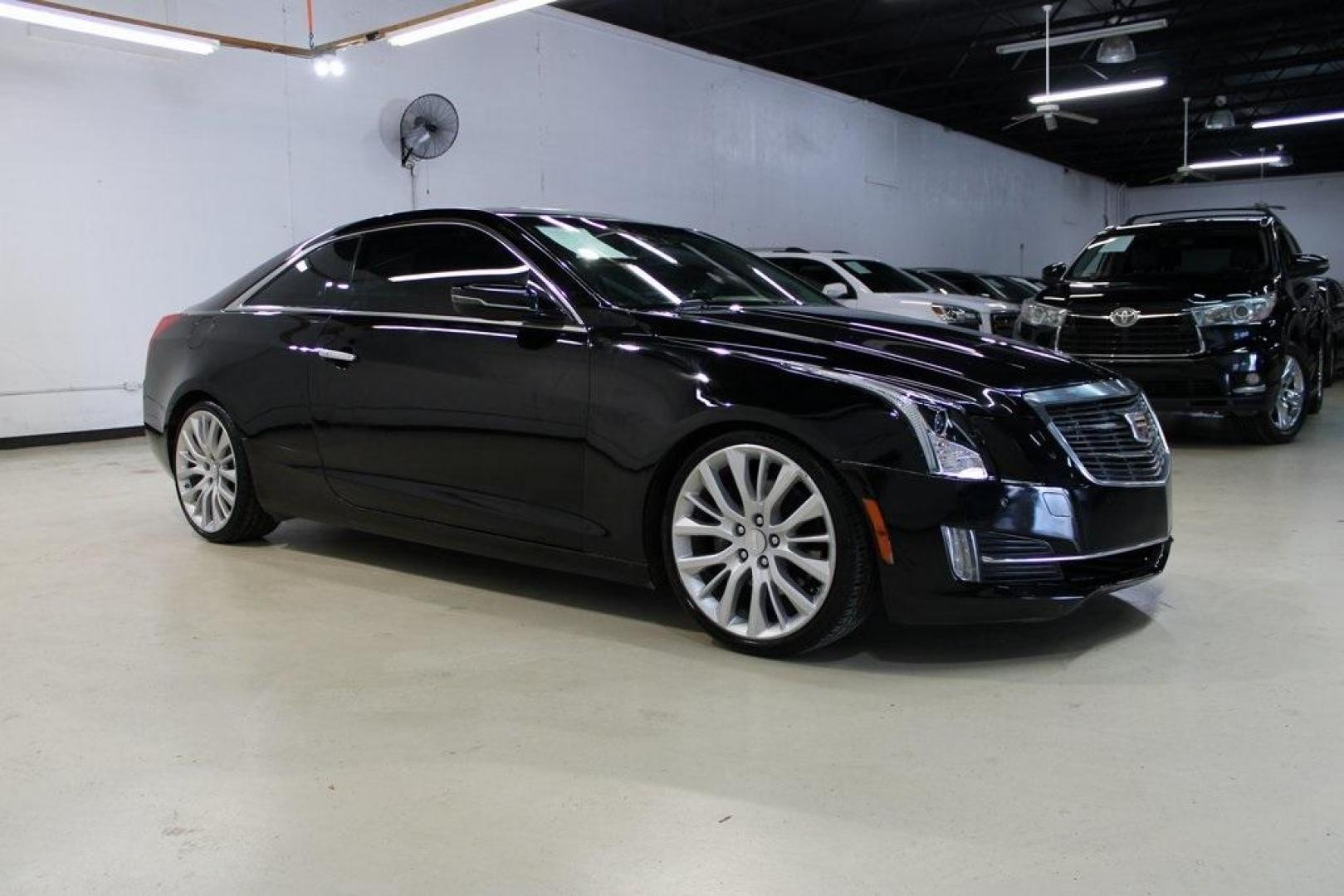 2017 Black Raven /Jet Black With Jet Black Accents Cadillac ATS 3.6L Premium Luxury (1G6AE1RSXH0) with an 3.6L V6 SIDI DOHC VVT engine, Automatic transmission, located at 15300 Midway Rd., Addison, TX, 75001, (972) 702-0011, 32.958321, -96.838074 - HOME OF THE NO HAGGLE PRICE - WHOLESALE PRICES TO THE PUBLIC!! ATS 3.6L Premium Luxury, 2D Coupe, 3.6L V6 SIDI DOHC VVT, 8-Speed Automatic, RWD, Black Raven, Jet Black With Jet Black Accents Leather.<br><br>Black Raven 2017 Cadillac ATS 3.6L Premium Luxury<br><br>20/30 City/Highway MPG<br><br><br>At - Photo#5