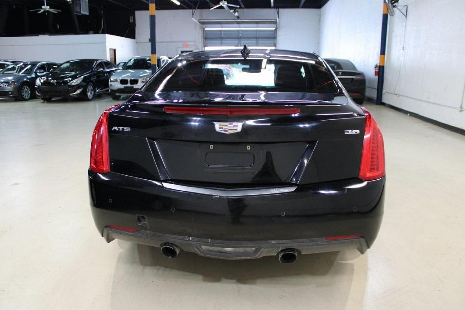 2017 Black Raven /Jet Black With Jet Black Accents Cadillac ATS 3.6L Premium Luxury (1G6AE1RSXH0) with an 3.6L V6 SIDI DOHC VVT engine, Automatic transmission, located at 15300 Midway Rd., Addison, TX, 75001, (972) 702-0011, 32.958321, -96.838074 - HOME OF THE NO HAGGLE PRICE - WHOLESALE PRICES TO THE PUBLIC!! ATS 3.6L Premium Luxury, 2D Coupe, 3.6L V6 SIDI DOHC VVT, 8-Speed Automatic, RWD, Black Raven, Jet Black With Jet Black Accents Leather.<br><br>Black Raven 2017 Cadillac ATS 3.6L Premium Luxury<br><br>20/30 City/Highway MPG<br><br><br>At - Photo#6