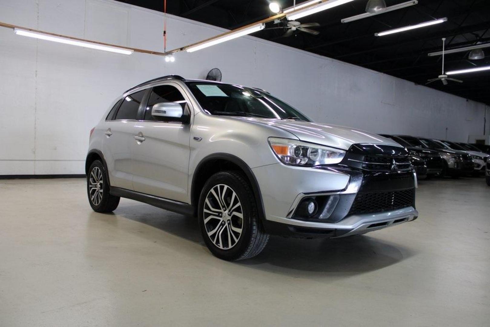 2018 Alloy Silver Metallic /Black Mitsubishi Outlander Sport SEL (JA4AP4AW9JZ) with an 2.4L MIVEC DOHC 16V 4-Cylinder engine, CVT transmission, located at 15300 Midway Rd., Addison, TX, 75001, (972) 702-0011, 32.958321, -96.838074 - HOME OF THE NO HAGGLE PRICE - WHOLESALE PRICES TO THE PUBLIC!! Outlander Sport SEL, 4D Sport Utility, 2.4L MIVEC DOHC 16V 4-Cylinder, CVT, FWD, Silver, Leather.<br><br>Silver 2018 Mitsubishi Outlander Sport SEL<br><br>Recent Arrival! 23/29 City/Highway MPG<br><br><br>At Midway Auto Group, we strive - Photo#1