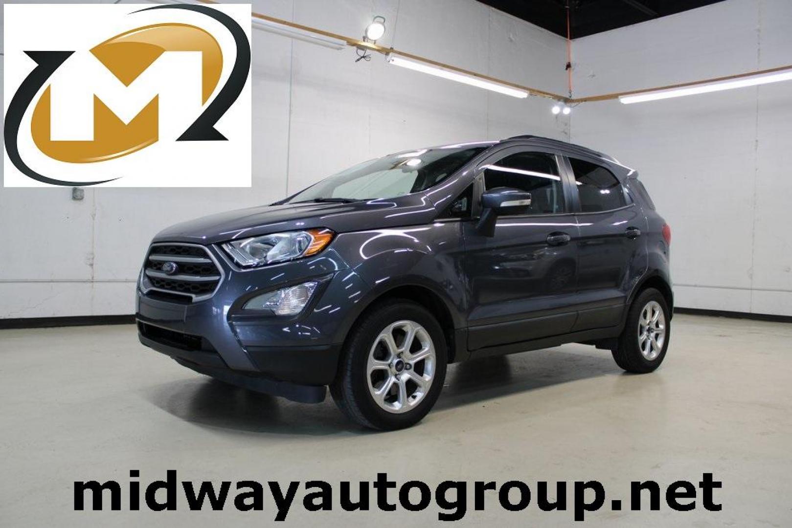 2018 Smoke /Ebony Black Ford EcoSport SE (MAJ3P1TEXJC) with an EcoBoost 1.0L I3 GTDi DOHC Turbocharged VCT engine, Automatic transmission, located at 15300 Midway Rd., Addison, TX, 75001, (972) 702-0011, 32.958321, -96.838074 - Photo#0