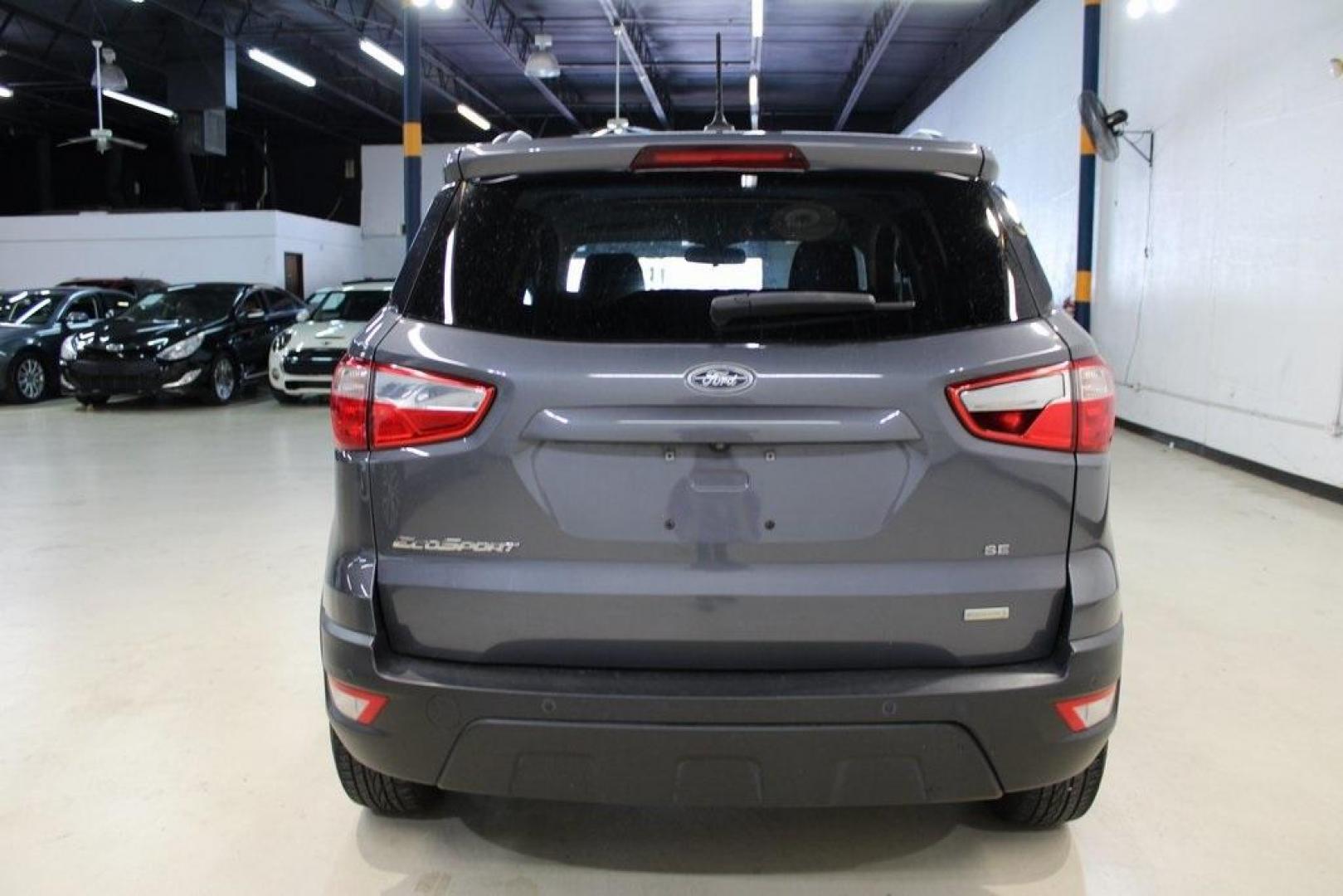 2018 Smoke /Ebony Black Ford EcoSport SE (MAJ3P1TEXJC) with an EcoBoost 1.0L I3 GTDi DOHC Turbocharged VCT engine, Automatic transmission, located at 15300 Midway Rd., Addison, TX, 75001, (972) 702-0011, 32.958321, -96.838074 - Photo#9