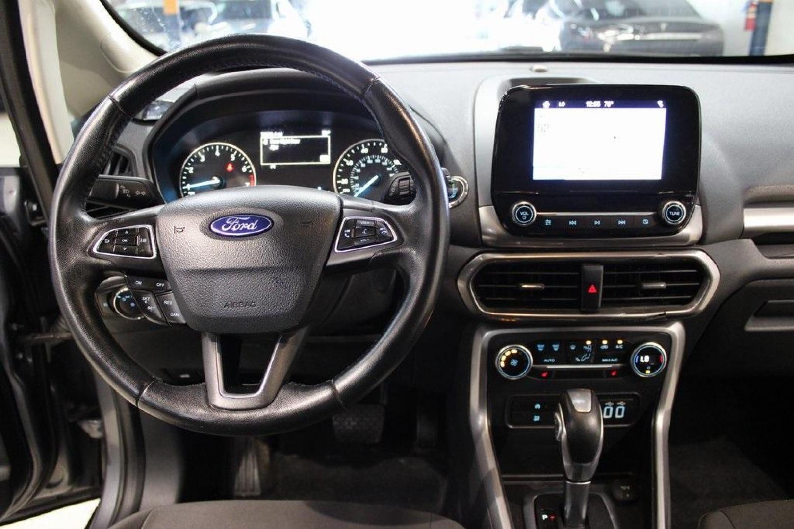 2018 Smoke /Ebony Black Ford EcoSport SE (MAJ3P1TEXJC) with an EcoBoost 1.0L I3 GTDi DOHC Turbocharged VCT engine, Automatic transmission, located at 15300 Midway Rd., Addison, TX, 75001, (972) 702-0011, 32.958321, -96.838074 - HOME OF THE NO HAGGLE PRICE - WHOLESALE PRICES TO THE PUBLIC!! EcoSport SE, 4D Sport Utility, EcoBoost 1.0L I3 GTDi DOHC Turbocharged VCT, 6-Speed Automatic, FWD, Smoke, Ebony Black Cloth.<br><br>Smoke 2018 Ford EcoSport SE<br><br>Recent Arrival! 27/29 City/Highway MPG<br><br>Awards:<br> * 2018 KBB - Photo#19