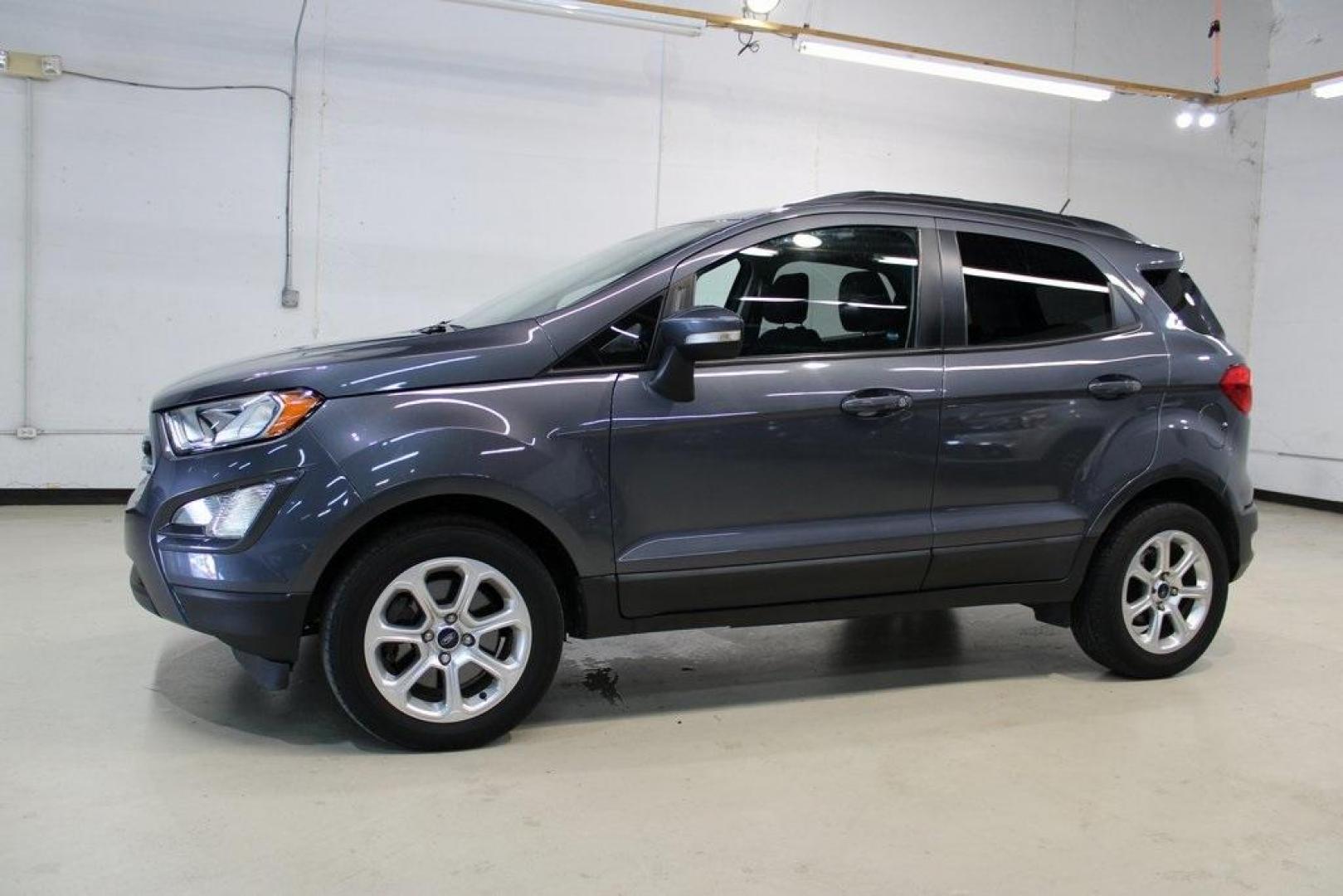 2018 Smoke /Ebony Black Ford EcoSport SE (MAJ3P1TEXJC) with an EcoBoost 1.0L I3 GTDi DOHC Turbocharged VCT engine, Automatic transmission, located at 15300 Midway Rd., Addison, TX, 75001, (972) 702-0011, 32.958321, -96.838074 - HOME OF THE NO HAGGLE PRICE - WHOLESALE PRICES TO THE PUBLIC!! EcoSport SE, 4D Sport Utility, EcoBoost 1.0L I3 GTDi DOHC Turbocharged VCT, 6-Speed Automatic, FWD, Smoke, Ebony Black Cloth.<br><br>Smoke 2018 Ford EcoSport SE<br><br>Recent Arrival! 27/29 City/Highway MPG<br><br>Awards:<br> * 2018 KBB - Photo#5