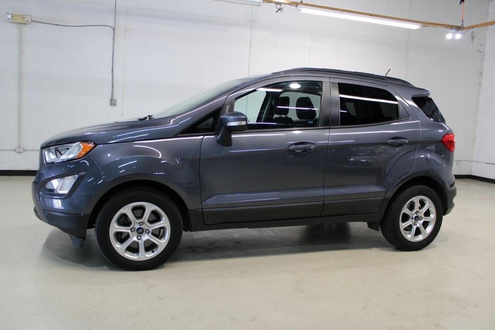 2018 Smoke /Ebony Black Ford EcoSport SE (MAJ3P1TEXJC) with an EcoBoost 1.0L I3 GTDi DOHC Turbocharged VCT engine, Automatic transmission, located at 15300 Midway Rd., Addison, TX, 75001, (972) 702-0011, 32.958321, -96.838074 - HOME OF THE NO HAGGLE PRICE - WHOLESALE PRICES TO THE PUBLIC!! EcoSport SE, 4D Sport Utility, EcoBoost 1.0L I3 GTDi DOHC Turbocharged VCT, 6-Speed Automatic, FWD, Smoke, Ebony Black Cloth.<br><br>Smoke 2018 Ford EcoSport SE<br><br>Recent Arrival! 27/29 City/Highway MPG<br><br>Awards:<br> * 2018 KBB - Photo#6