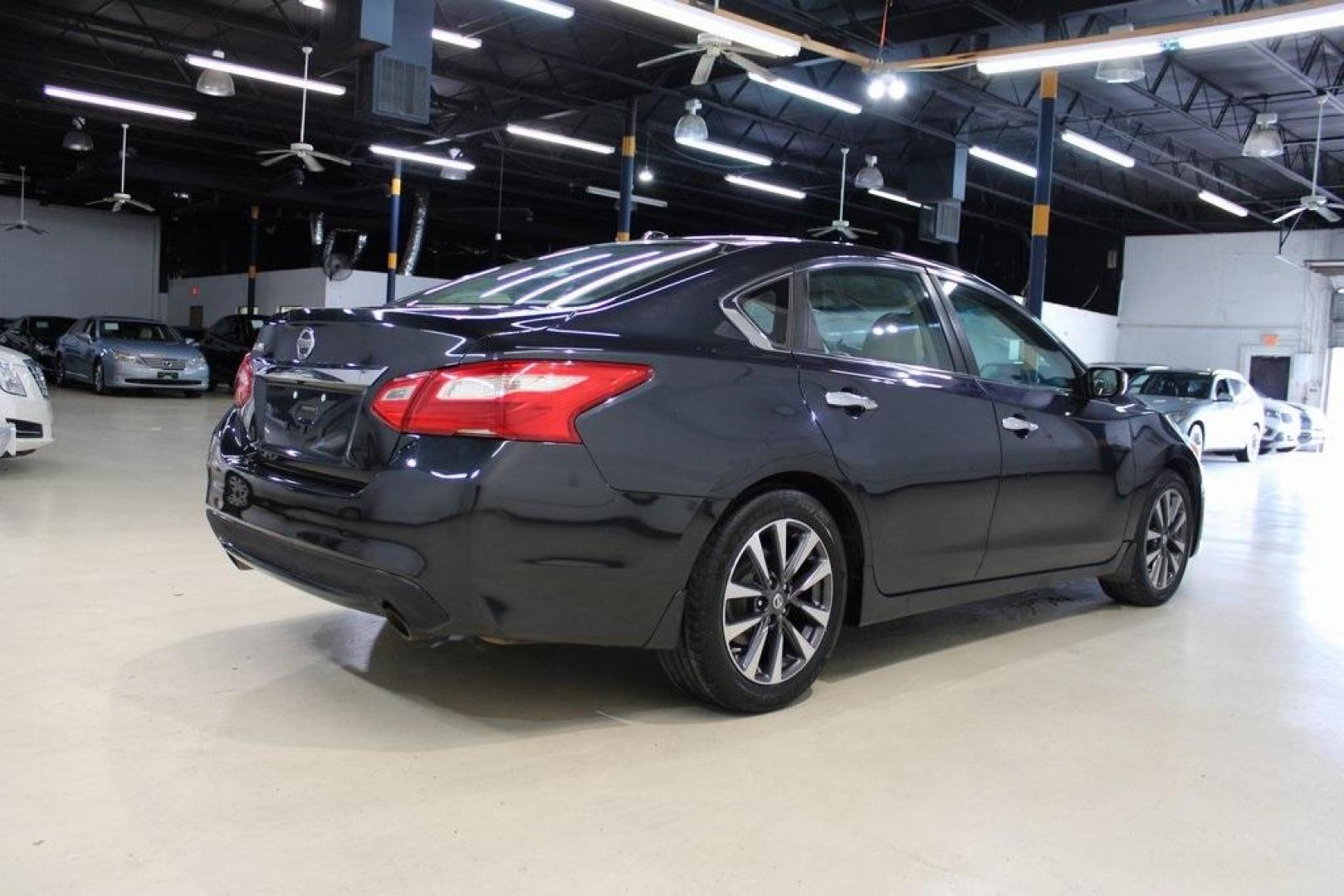 2016 Storm Blue /Beige Nissan Altima 2.5 SV (1N4AL3AP3GC) with an 2.5L 4-Cylinder DOHC 16V engine, CVT transmission, located at 15300 Midway Rd., Addison, TX, 75001, (972) 702-0011, 32.958321, -96.838074 - HOME OF THE NO HAGGLE PRICE - WHOLESALE PRICES TO THE PUBLIC!! Altima 2.5 SV, 4D Sedan, 2.5L 4-Cylinder DOHC 16V, CVT with Xtronic, FWD, Storm Blue, Beige Cloth.<br><br>Storm Blue 2016 Nissan Altima 2.5 SV<br><br>27/39 City/Highway MPG<br><br>Awards:<br> * 2016 KBB.com 10 Best Sedans Under $25,000< - Photo#2