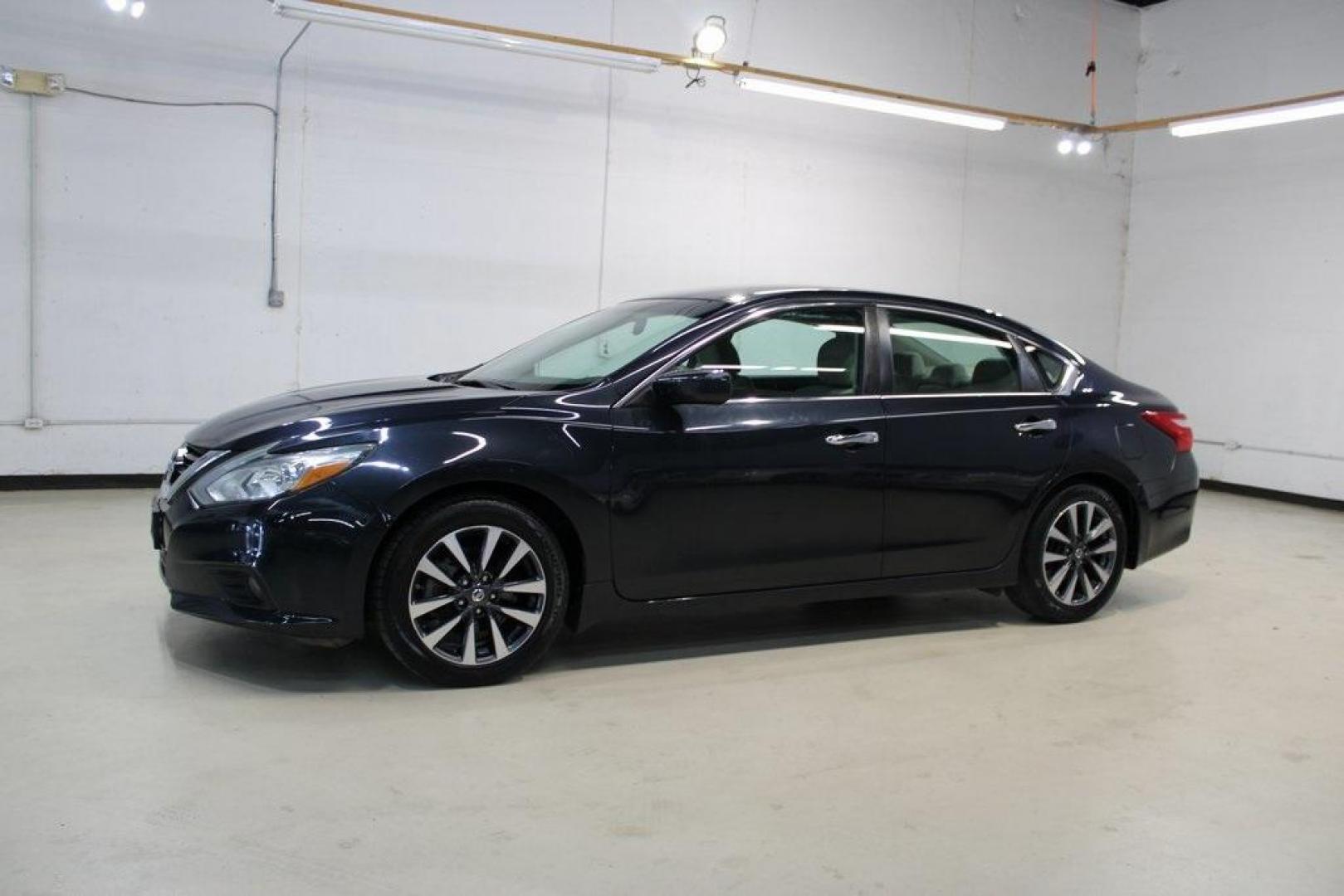 2016 Storm Blue /Beige Nissan Altima 2.5 SV (1N4AL3AP3GC) with an 2.5L 4-Cylinder DOHC 16V engine, CVT transmission, located at 15300 Midway Rd., Addison, TX, 75001, (972) 702-0011, 32.958321, -96.838074 - HOME OF THE NO HAGGLE PRICE - WHOLESALE PRICES TO THE PUBLIC!! Altima 2.5 SV, 4D Sedan, 2.5L 4-Cylinder DOHC 16V, CVT with Xtronic, FWD, Storm Blue, Beige Cloth.<br><br>Storm Blue 2016 Nissan Altima 2.5 SV<br><br>27/39 City/Highway MPG<br><br>Awards:<br> * 2016 KBB.com 10 Best Sedans Under $25,000< - Photo#4