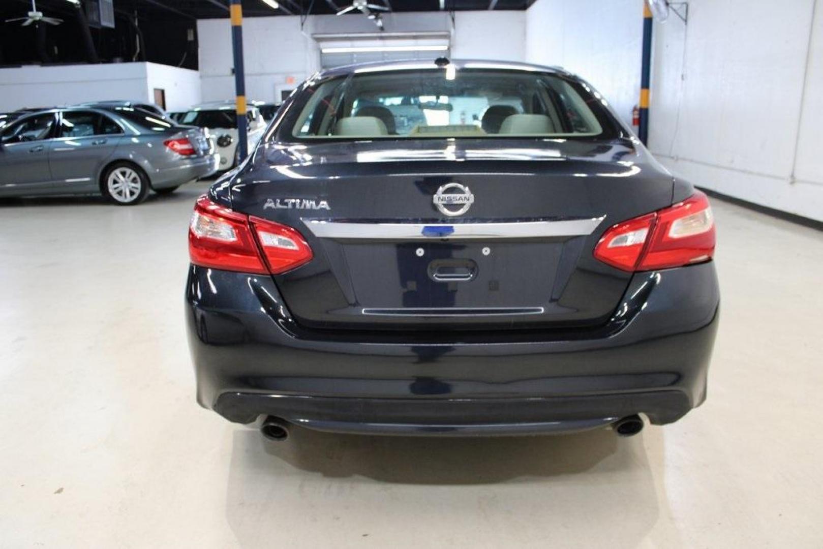 2016 Storm Blue /Beige Nissan Altima 2.5 SV (1N4AL3AP3GC) with an 2.5L 4-Cylinder DOHC 16V engine, CVT transmission, located at 15300 Midway Rd., Addison, TX, 75001, (972) 702-0011, 32.958321, -96.838074 - HOME OF THE NO HAGGLE PRICE - WHOLESALE PRICES TO THE PUBLIC!! Altima 2.5 SV, 4D Sedan, 2.5L 4-Cylinder DOHC 16V, CVT with Xtronic, FWD, Storm Blue, Beige Cloth.<br><br>Storm Blue 2016 Nissan Altima 2.5 SV<br><br>27/39 City/Highway MPG<br><br>Awards:<br> * 2016 KBB.com 10 Best Sedans Under $25,000< - Photo#7