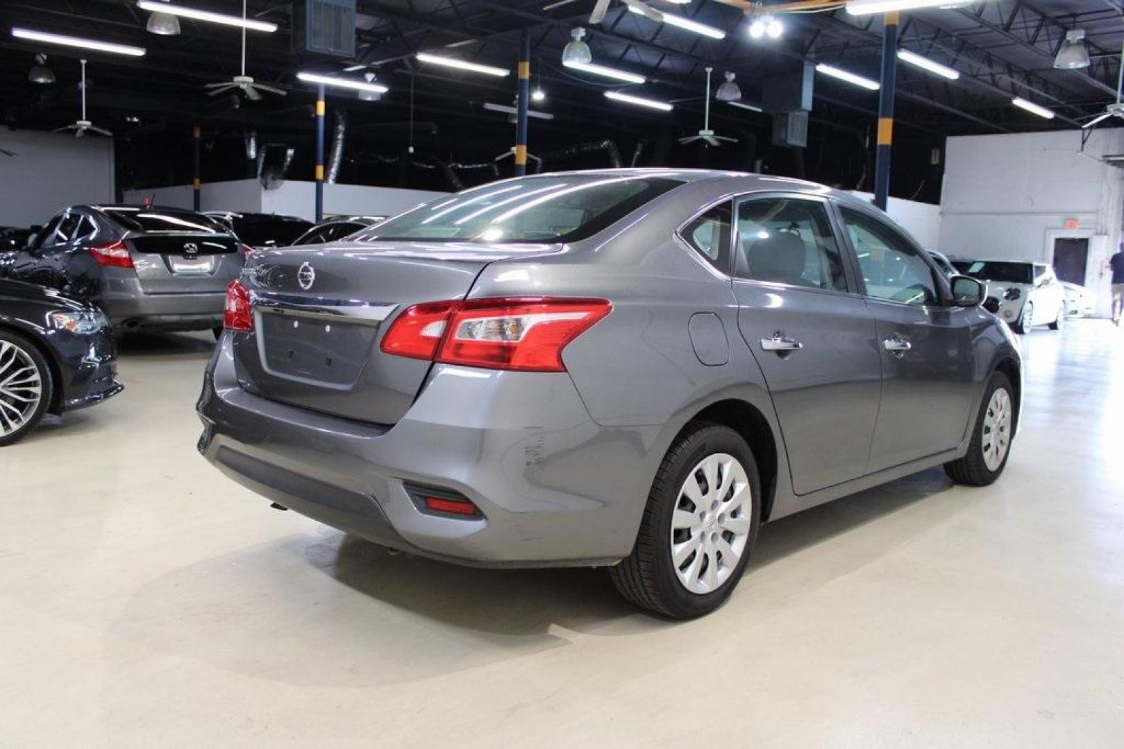 2019 Gun Metallic /Charcoal Nissan Sentra S (3N1AB7AP1KY) with an 1.8L 4-Cylinder DOHC 16V engine, CVT transmission, located at 15300 Midway Rd., Addison, TX, 75001, (972) 702-0011, 32.958321, -96.838074 - HOME OF THE NO HAGGLE PRICE - WHOLESALE PRICES TO THE PUBLIC!! Sentra S, 4D Sedan, 1.8L 4-Cylinder DOHC 16V, CVT with Xtronic, FWD, Gun Metallic, Charcoal Cloth.<br><br>Gun Metallic 2019 Nissan Sentra S<br><br>29/37 City/Highway MPG<br><br><br>At Midway Auto Group, we strive to provide you with the - Photo#2