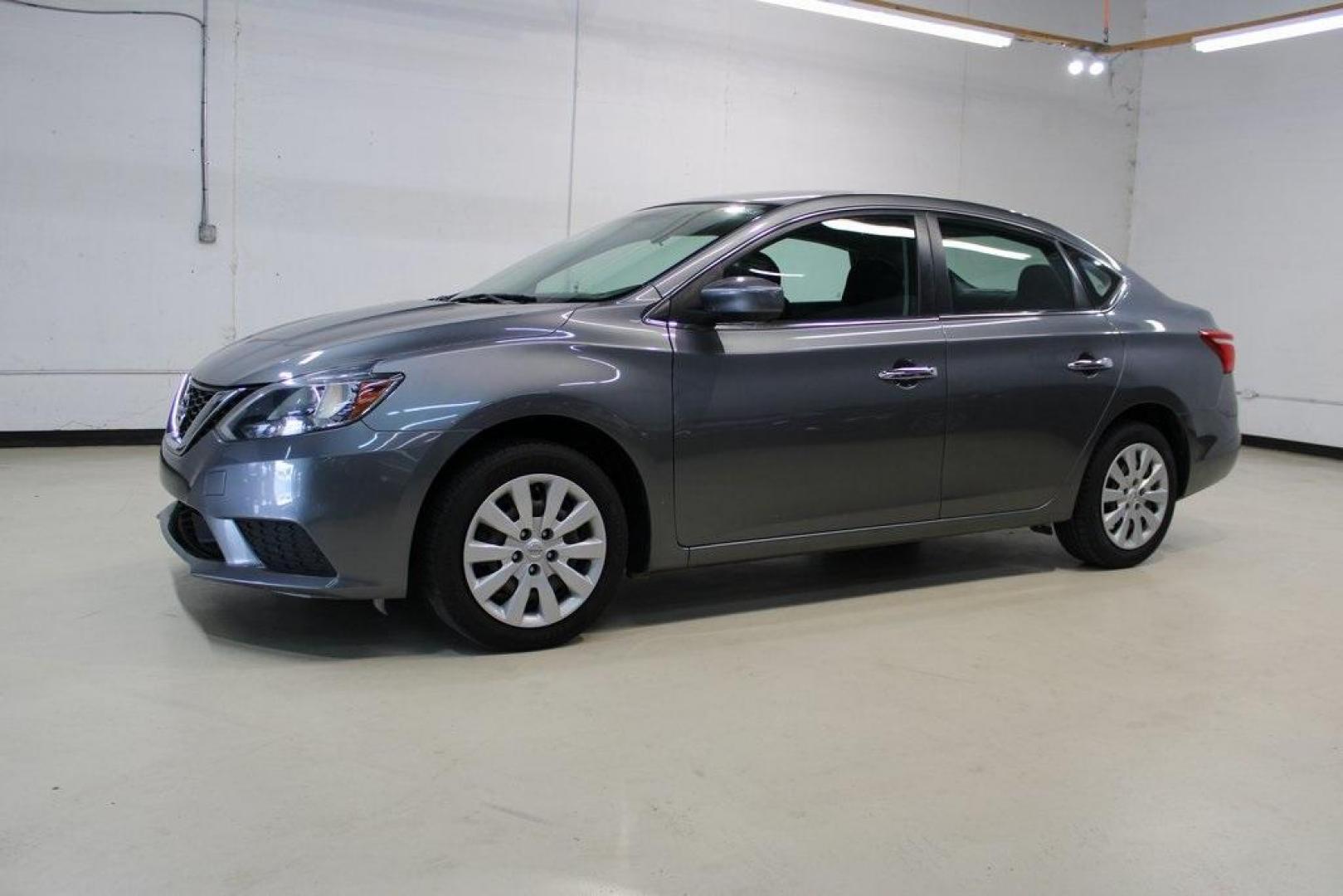 2019 Gun Metallic /Charcoal Nissan Sentra S (3N1AB7AP1KY) with an 1.8L 4-Cylinder DOHC 16V engine, CVT transmission, located at 15300 Midway Rd., Addison, TX, 75001, (972) 702-0011, 32.958321, -96.838074 - HOME OF THE NO HAGGLE PRICE - WHOLESALE PRICES TO THE PUBLIC!! Sentra S, 4D Sedan, 1.8L 4-Cylinder DOHC 16V, CVT with Xtronic, FWD, Gun Metallic, Charcoal Cloth.<br><br>Gun Metallic 2019 Nissan Sentra S<br><br>29/37 City/Highway MPG<br><br><br>At Midway Auto Group, we strive to provide you with the - Photo#4