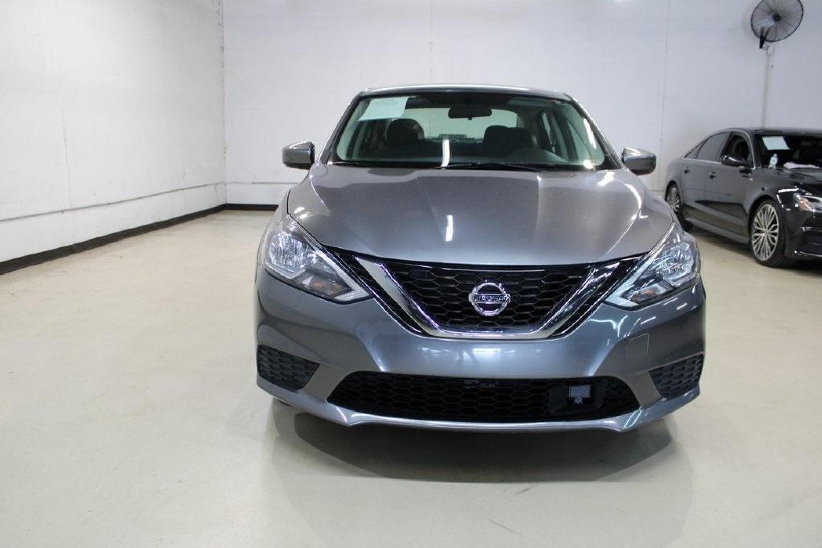 2019 Gun Metallic /Charcoal Nissan Sentra S (3N1AB7AP1KY) with an 1.8L 4-Cylinder DOHC 16V engine, CVT transmission, located at 15300 Midway Rd., Addison, TX, 75001, (972) 702-0011, 32.958321, -96.838074 - HOME OF THE NO HAGGLE PRICE - WHOLESALE PRICES TO THE PUBLIC!! Sentra S, 4D Sedan, 1.8L 4-Cylinder DOHC 16V, CVT with Xtronic, FWD, Gun Metallic, Charcoal Cloth.<br><br>Gun Metallic 2019 Nissan Sentra S<br><br>29/37 City/Highway MPG<br><br><br>At Midway Auto Group, we strive to provide you with the - Photo#5