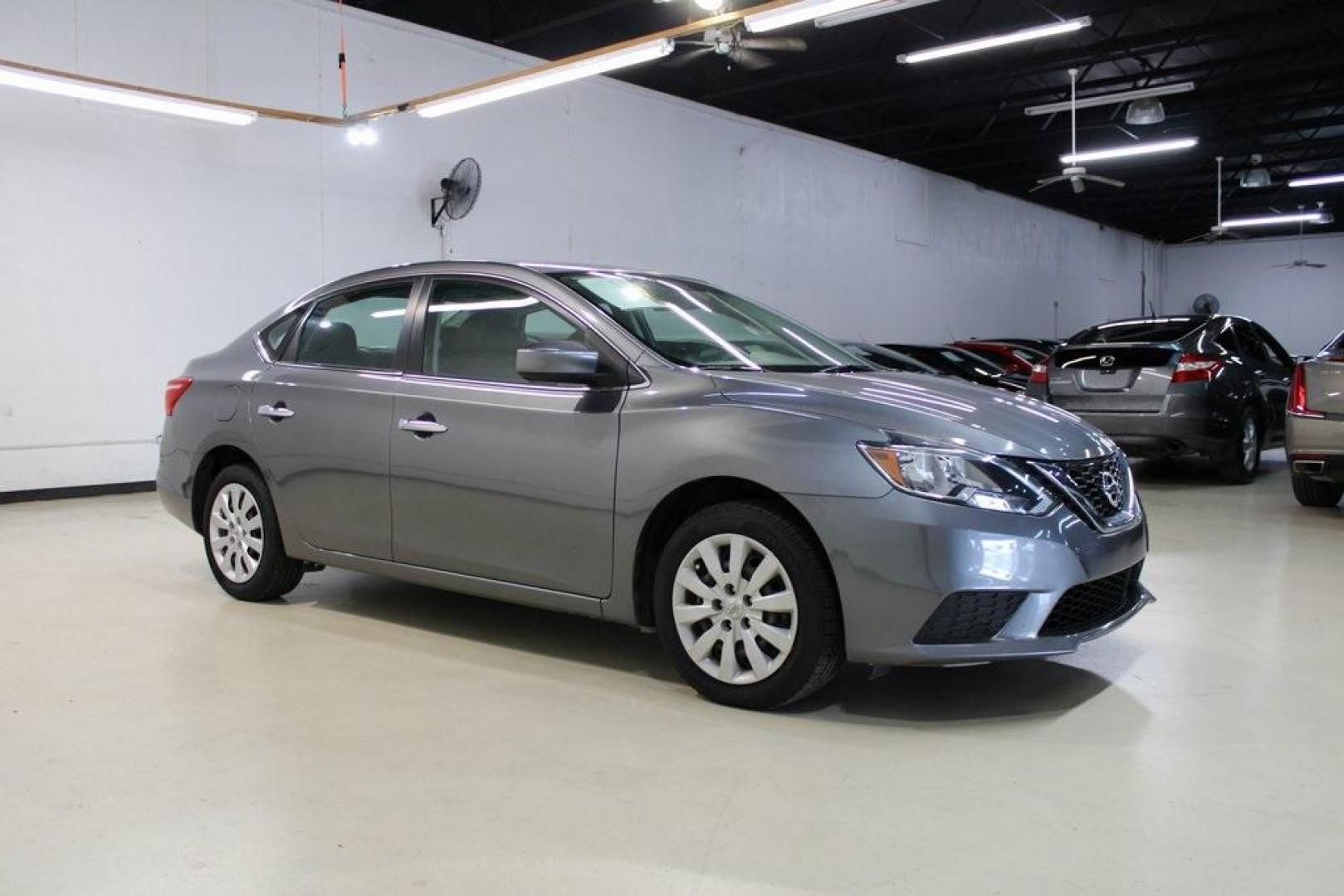 2019 Gun Metallic /Charcoal Nissan Sentra S (3N1AB7AP1KY) with an 1.8L 4-Cylinder DOHC 16V engine, CVT transmission, located at 15300 Midway Rd., Addison, TX, 75001, (972) 702-0011, 32.958321, -96.838074 - HOME OF THE NO HAGGLE PRICE - WHOLESALE PRICES TO THE PUBLIC!! Sentra S, 4D Sedan, 1.8L 4-Cylinder DOHC 16V, CVT with Xtronic, FWD, Gun Metallic, Charcoal Cloth.<br><br>Gun Metallic 2019 Nissan Sentra S<br><br>29/37 City/Highway MPG<br><br><br>At Midway Auto Group, we strive to provide you with the - Photo#6