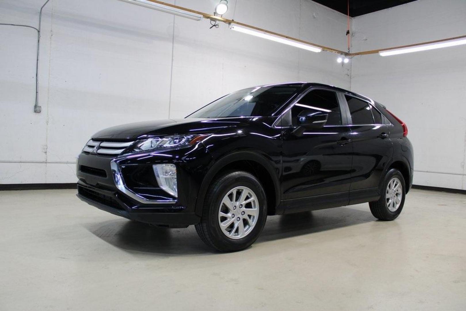 2019 Tarmac Black Metallic /Gray Mitsubishi Eclipse Cross ES (JA4AT3AA2KZ) with an 1.5L I4 Turbocharged DOHC 16V LEV3-ULEV70 152hp engine, CVT transmission, located at 15300 Midway Rd., Addison, TX, 75001, (972) 702-0011, 32.958321, -96.838074 - HOME OF THE NO HAGGLE PRICE - WHOLESALE PRICES TO THE PUBLIC!! Eclipse Cross ES, 4D Sport Utility, 1.5L I4 Turbocharged DOHC 16V LEV3-ULEV70 152hp, CVT, 4WD, Black, Gray Cloth.<br><br>Black 2019 Mitsubishi Eclipse Cross ES<br><br>Recent Arrival! 25/28 City/Highway MPG<br><br><br>At Midway Auto Group - Photo#1