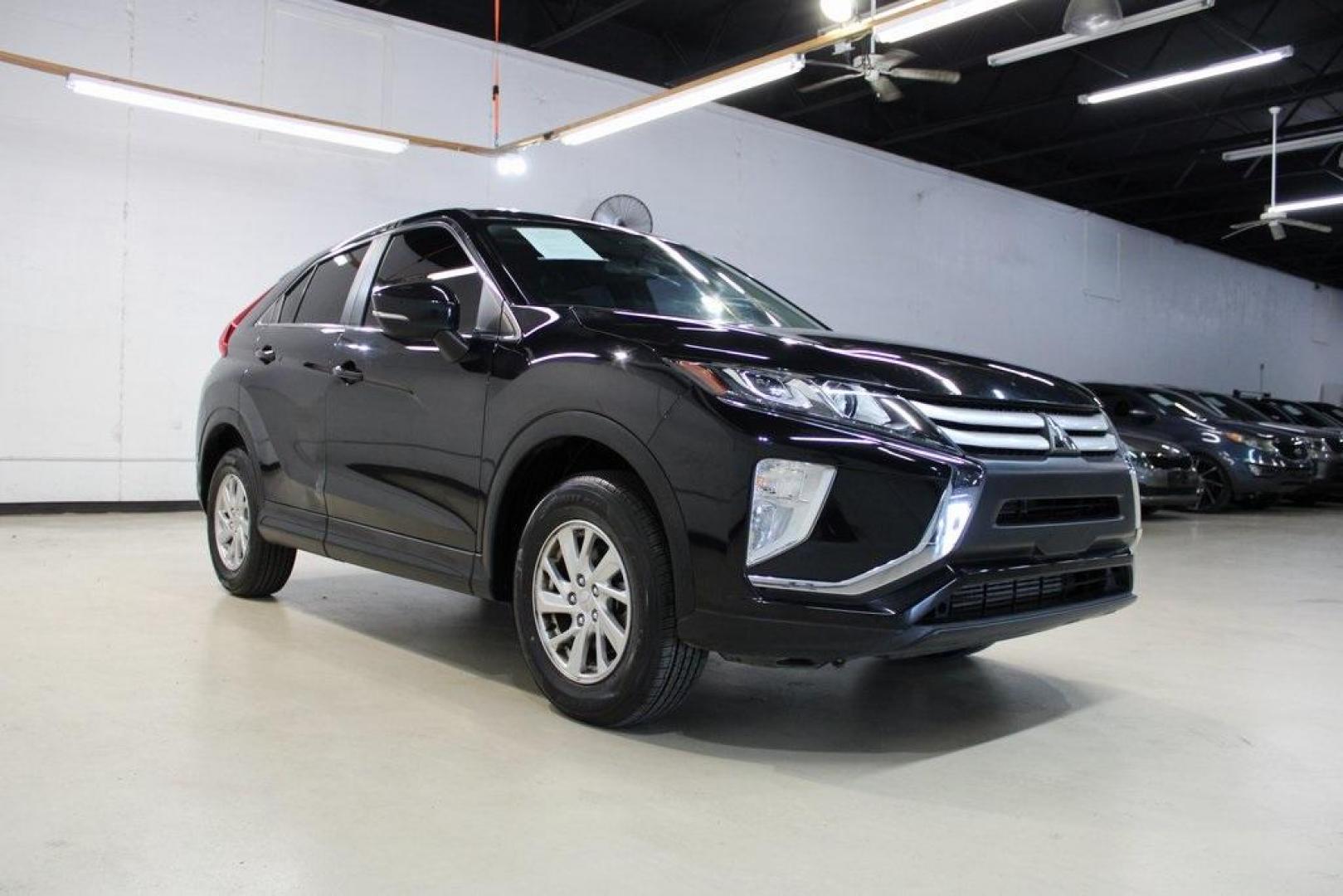 2019 Tarmac Black Metallic /Gray Mitsubishi Eclipse Cross ES (JA4AT3AA2KZ) with an 1.5L I4 Turbocharged DOHC 16V LEV3-ULEV70 152hp engine, CVT transmission, located at 15300 Midway Rd., Addison, TX, 75001, (972) 702-0011, 32.958321, -96.838074 - HOME OF THE NO HAGGLE PRICE - WHOLESALE PRICES TO THE PUBLIC!! Eclipse Cross ES, 4D Sport Utility, 1.5L I4 Turbocharged DOHC 16V LEV3-ULEV70 152hp, CVT, 4WD, Black, Gray Cloth.<br><br>Black 2019 Mitsubishi Eclipse Cross ES<br><br>Recent Arrival! 25/28 City/Highway MPG<br><br><br>At Midway Auto Group - Photo#2