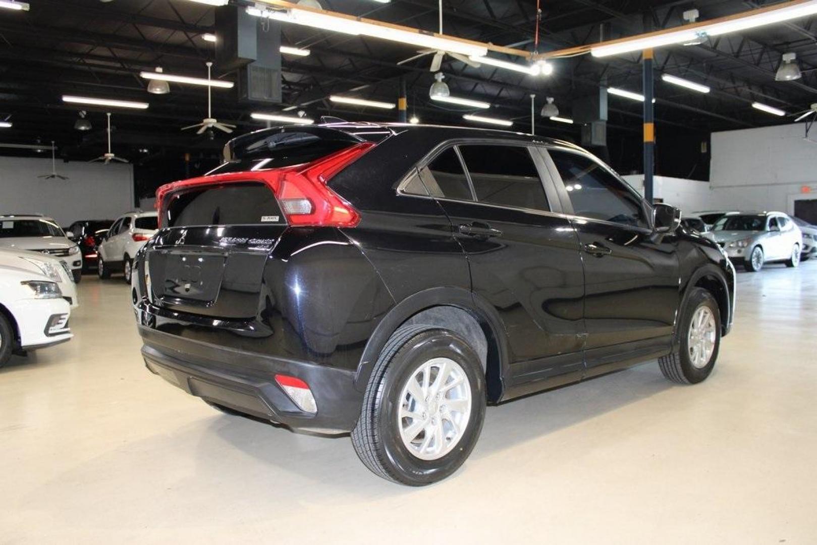 2019 Tarmac Black Metallic /Gray Mitsubishi Eclipse Cross ES (JA4AT3AA2KZ) with an 1.5L I4 Turbocharged DOHC 16V LEV3-ULEV70 152hp engine, CVT transmission, located at 15300 Midway Rd., Addison, TX, 75001, (972) 702-0011, 32.958321, -96.838074 - Photo#3