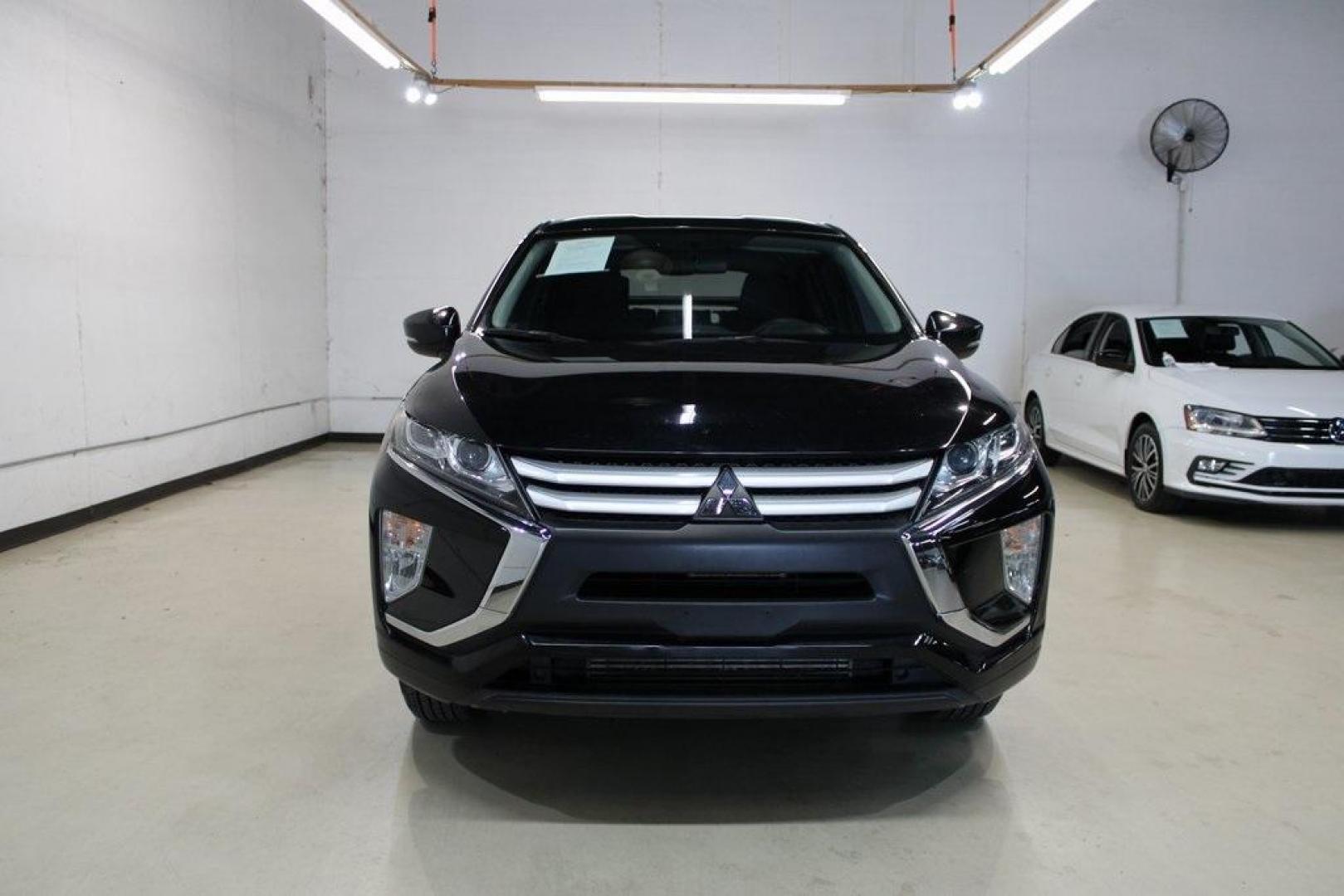 2019 Tarmac Black Metallic /Gray Mitsubishi Eclipse Cross ES (JA4AT3AA2KZ) with an 1.5L I4 Turbocharged DOHC 16V LEV3-ULEV70 152hp engine, CVT transmission, located at 15300 Midway Rd., Addison, TX, 75001, (972) 702-0011, 32.958321, -96.838074 - HOME OF THE NO HAGGLE PRICE - WHOLESALE PRICES TO THE PUBLIC!! Eclipse Cross ES, 4D Sport Utility, 1.5L I4 Turbocharged DOHC 16V LEV3-ULEV70 152hp, CVT, 4WD, Black, Gray Cloth.<br><br>Black 2019 Mitsubishi Eclipse Cross ES<br><br>Recent Arrival! 25/28 City/Highway MPG<br><br><br>At Midway Auto Group - Photo#4