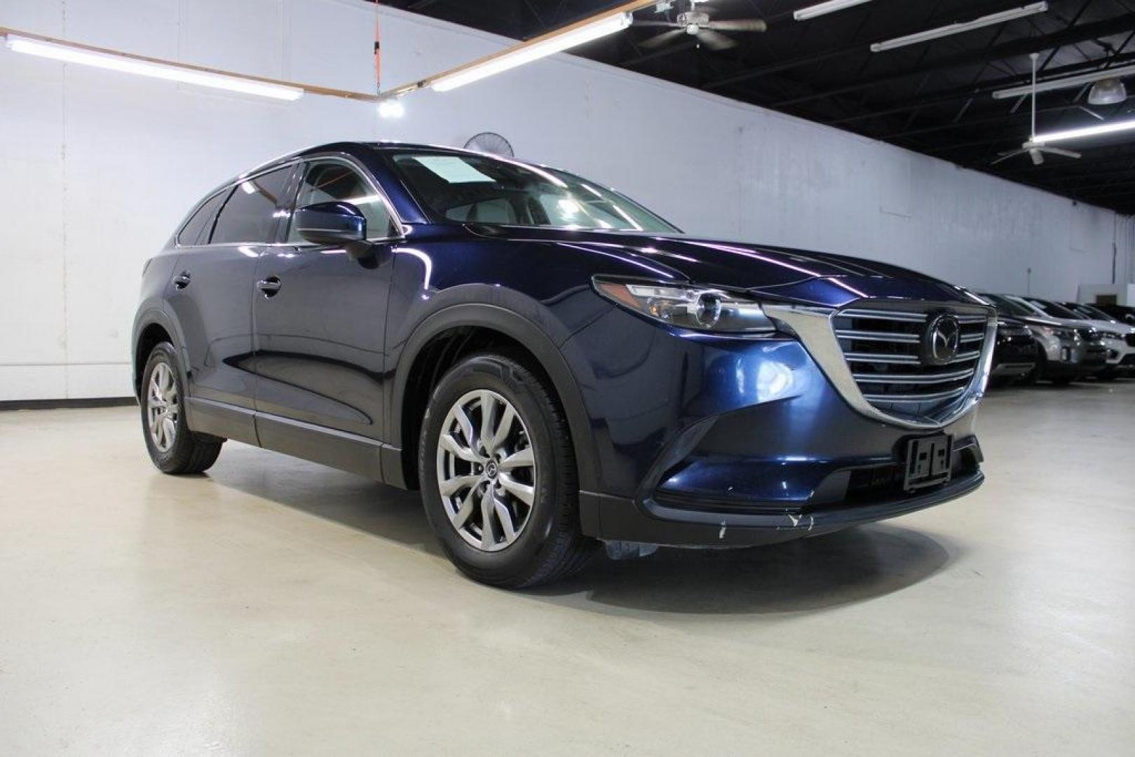 2019 Deep Crystal Blue Mica /Sand Mazda CX-9 Touring (JM3TCACY5K0) with an 2.5L 4-Cylinder engine, Automatic transmission, located at 15300 Midway Rd., Addison, TX, 75001, (972) 702-0011, 32.958321, -96.838074 - HOME OF THE NO HAGGLE PRICE - WHOLESALE PRICES TO THE PUBLIC!! CX-9 Touring, 4D Sport Utility, 2.5L 4-Cylinder, 6-Speed Automatic, FWD, Deep Crystal Blue Mica, Sand Leather.<br><br>Deep Crystal Blue Mica 2019 Mazda CX-9 Touring<br><br>Recent Arrival! 22/28 City/Highway MPG<br><br>Awards:<br> * 2019 - Photo#1