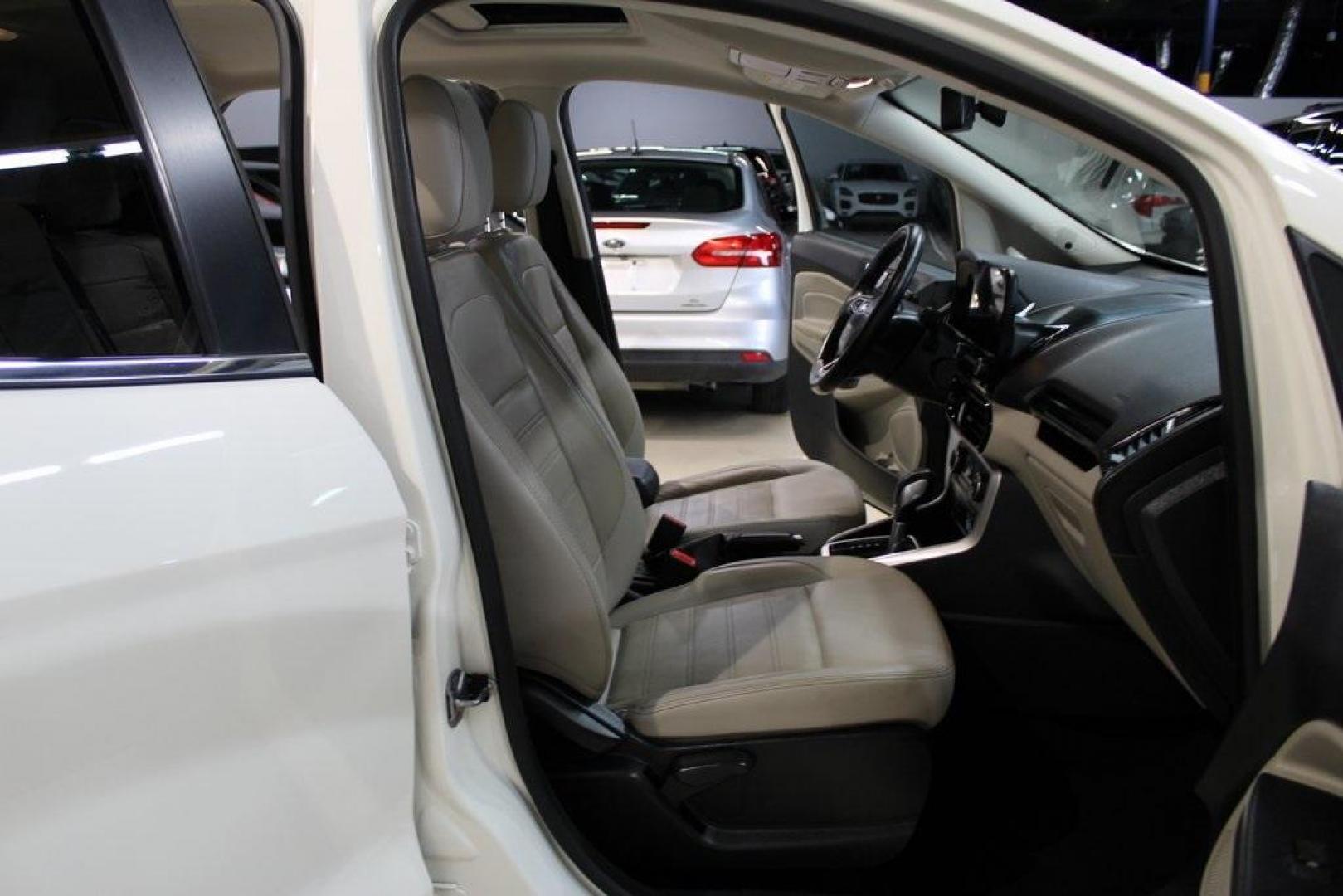 2020 White /Ebony Black Ford EcoSport Titanium (MAJ6S3KL4LC) with an 2.0L I4 Ti-VCT GDI engine, Automatic transmission, located at 15300 Midway Rd., Addison, TX, 75001, (972) 702-0011, 32.958321, -96.838074 - HOME OF THE NO HAGGLE PRICE - WHOLESALE PRICES TO THE PUBLIC!! EcoSport Titanium, 4D Sport Utility, 2.0L I4 Ti-VCT GDI, 6-Speed Automatic, 4WD, White, Ebony Black Leather.<br><br>White 2020 Ford EcoSport Titanium<br><br>Recent Arrival! 23/29 City/Highway MPG<br><br><br>At Midway Auto Group, we striv - Photo#14