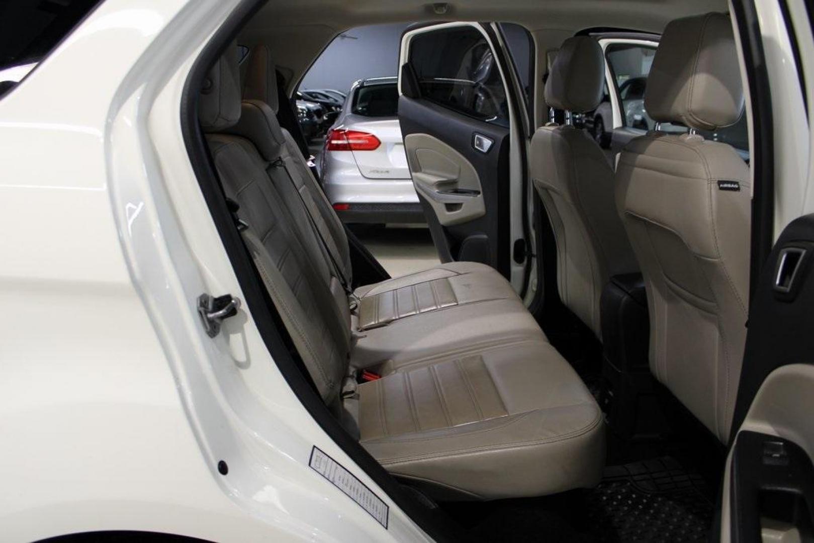 2020 White /Ebony Black Ford EcoSport Titanium (MAJ6S3KL4LC) with an 2.0L I4 Ti-VCT GDI engine, Automatic transmission, located at 15300 Midway Rd., Addison, TX, 75001, (972) 702-0011, 32.958321, -96.838074 - HOME OF THE NO HAGGLE PRICE - WHOLESALE PRICES TO THE PUBLIC!! EcoSport Titanium, 4D Sport Utility, 2.0L I4 Ti-VCT GDI, 6-Speed Automatic, 4WD, White, Ebony Black Leather.<br><br>White 2020 Ford EcoSport Titanium<br><br>Recent Arrival! 23/29 City/Highway MPG<br><br><br>At Midway Auto Group, we striv - Photo#15