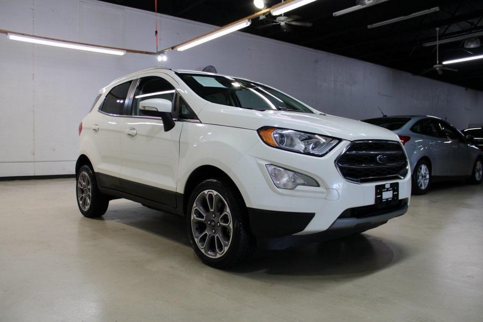 2020 White /Ebony Black Ford EcoSport Titanium (MAJ6S3KL4LC) with an 2.0L I4 Ti-VCT GDI engine, Automatic transmission, located at 15300 Midway Rd., Addison, TX, 75001, (972) 702-0011, 32.958321, -96.838074 - HOME OF THE NO HAGGLE PRICE - WHOLESALE PRICES TO THE PUBLIC!! EcoSport Titanium, 4D Sport Utility, 2.0L I4 Ti-VCT GDI, 6-Speed Automatic, 4WD, White, Ebony Black Leather.<br><br>White 2020 Ford EcoSport Titanium<br><br>Recent Arrival! 23/29 City/Highway MPG<br><br><br>At Midway Auto Group, we striv - Photo#1