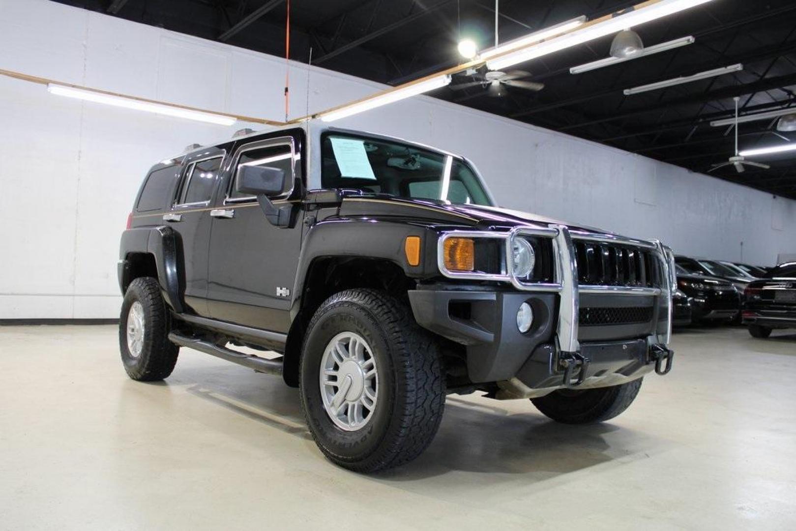 2010 Black /Ebony/Morocco-Toned Hummer H3 Luxury (5GTMNJEE2A8) with an 3.7L 5-Cylinder MPI DOHC engine, Automatic transmission, located at 15300 Midway Rd., Addison, TX, 75001, (972) 702-0011, 32.958321, -96.838074 - HOME OF THE NO HAGGLE PRICE - WHOLESALE PRICES TO THE PUBLIC!! H3 Luxury, 4D Sport Utility, 3.7L 5-Cylinder MPI DOHC, 4-Speed Automatic with Overdrive, 4WD, Black, Ebony/Morocco-Toned Leather.<br><br>Black 2010 Hummer H3 Luxury<br><br>Recent Arrival!<br><br><br>At Midway Auto Group, we strive to pro - Photo#1