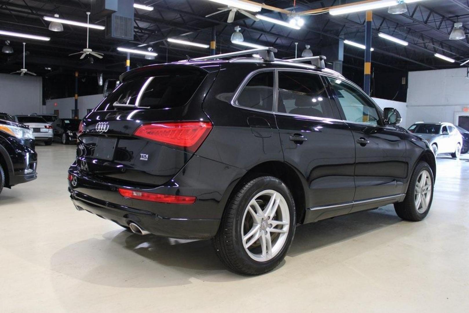 2014 Black /Black Audi Q5 3.0T Premium Plus (WA1CMAFP9EA) with an 3.0L TDI Turbodiesel engine, Automatic transmission, located at 15300 Midway Rd., Addison, TX, 75001, (972) 702-0011, 32.958321, -96.838074 - HOME OF THE NO HAGGLE PRICE - WHOLESALE PRICES TO THE PUBLIC!! Q5 3.0T Premium Plus quattro, 4D Sport Utility, 3.0L TDI Turbodiesel, 8-Speed Automatic, quattro, Black, Black Leather.<br><br>Black 2014 Audi Q5 3.0T Premium Plus<br><br>Recent Arrival! 24/31 City/Highway MPG<br><br>Awards:<br> * JD Po - Photo#2