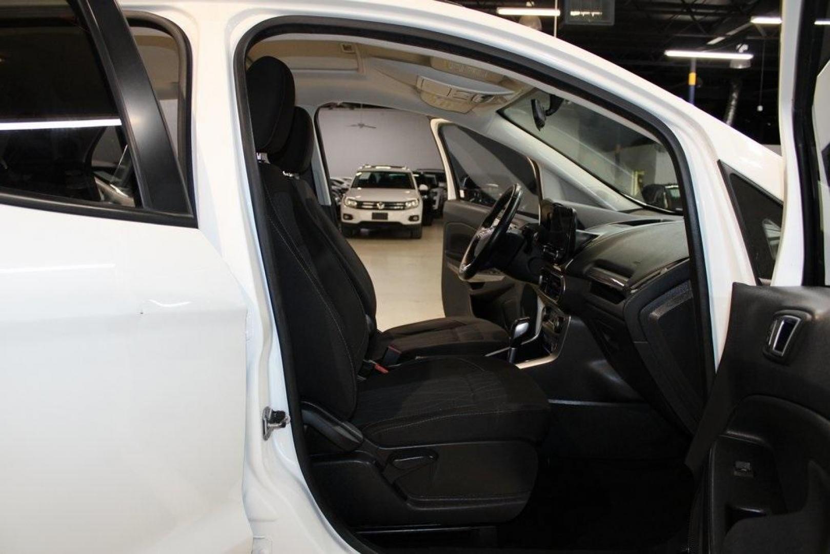 2019 Diamond White /Ebony Black Ford EcoSport SE (MAJ3S2GE8KC) with an EcoBoost 1.0L I3 GTDi DOHC Turbocharged VCT engine, Automatic transmission, located at 15300 Midway Rd., Addison, TX, 75001, (972) 702-0011, 32.958321, -96.838074 - HOME OF THE NO HAGGLE PRICE - WHOLESALE PRICES TO THE PUBLIC!! EcoSport SE, 4D Sport Utility, EcoBoost 1.0L I3 GTDi DOHC Turbocharged VCT, 6-Speed Automatic, FWD, Diamond White, Ebony Black Cloth.<br><br>Diamond White 2019 Ford EcoSport SE<br><br>Recent Arrival! 27/29 City/Highway MPG<br><br><br>At - Photo#14