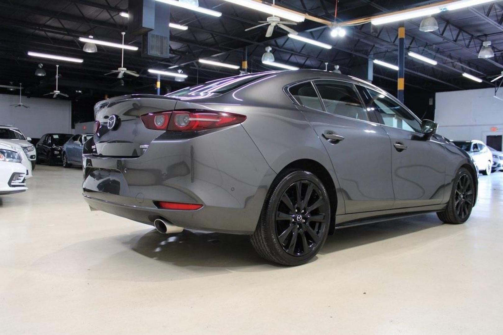 2021 Machine Gray Metallic /Black Mazda Mazda3 Premium Plus (JM1BPBEY9M1) with an I4 engine, Automatic transmission, located at 15300 Midway Rd., Addison, TX, 75001, (972) 702-0011, 32.958321, -96.838074 - HOME OF THE NO HAGGLE PRICE - WHOLESALE PRICES TO THE PUBLIC!! Mazda3 Premium Plus, 4D Sedan, I4, 6-Speed Automatic, AWD, Machine Gray Metallic, Black Leather.<br><br>Machine Gray Metallic 2021 Mazda Mazda3 Premium Plus<br><br>Recent Arrival! 23/32 City/Highway MPG<br><br><br>At Midway Auto Group, w - Photo#2