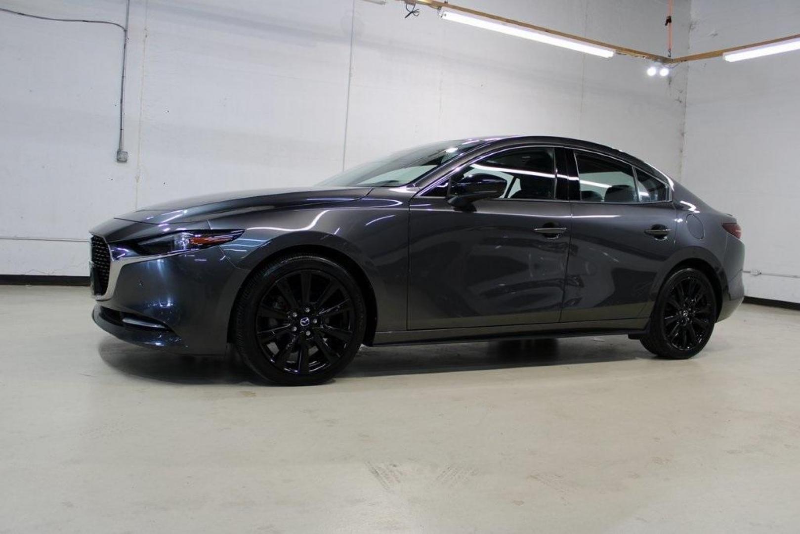 2021 Machine Gray Metallic /Black Mazda Mazda3 Premium Plus (JM1BPBEY9M1) with an I4 engine, Automatic transmission, located at 15300 Midway Rd., Addison, TX, 75001, (972) 702-0011, 32.958321, -96.838074 - HOME OF THE NO HAGGLE PRICE - WHOLESALE PRICES TO THE PUBLIC!! Mazda3 Premium Plus, 4D Sedan, I4, 6-Speed Automatic, AWD, Machine Gray Metallic, Black Leather.<br><br>Machine Gray Metallic 2021 Mazda Mazda3 Premium Plus<br><br>Recent Arrival! 23/32 City/Highway MPG<br><br><br>At Midway Auto Group, w - Photo#4