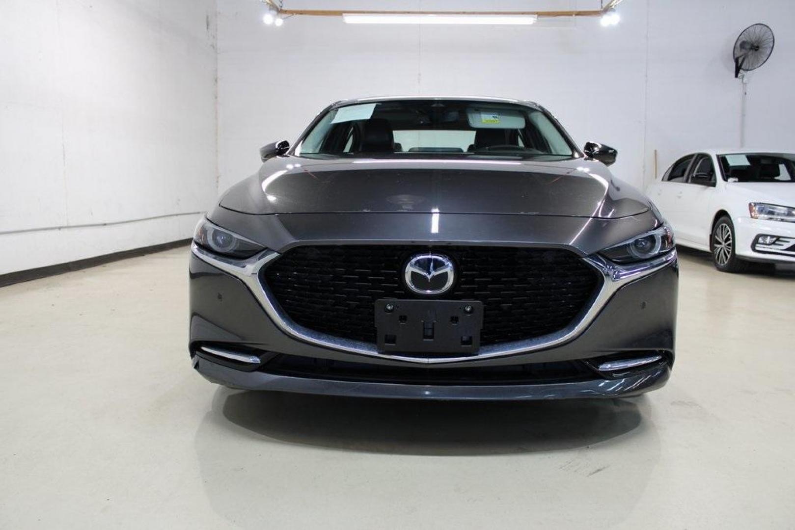 2021 Machine Gray Metallic /Black Mazda Mazda3 Premium Plus (JM1BPBEY9M1) with an I4 engine, Automatic transmission, located at 15300 Midway Rd., Addison, TX, 75001, (972) 702-0011, 32.958321, -96.838074 - HOME OF THE NO HAGGLE PRICE - WHOLESALE PRICES TO THE PUBLIC!! Mazda3 Premium Plus, 4D Sedan, I4, 6-Speed Automatic, AWD, Machine Gray Metallic, Black Leather.<br><br>Machine Gray Metallic 2021 Mazda Mazda3 Premium Plus<br><br>Recent Arrival! 23/32 City/Highway MPG<br><br><br>At Midway Auto Group, w - Photo#5