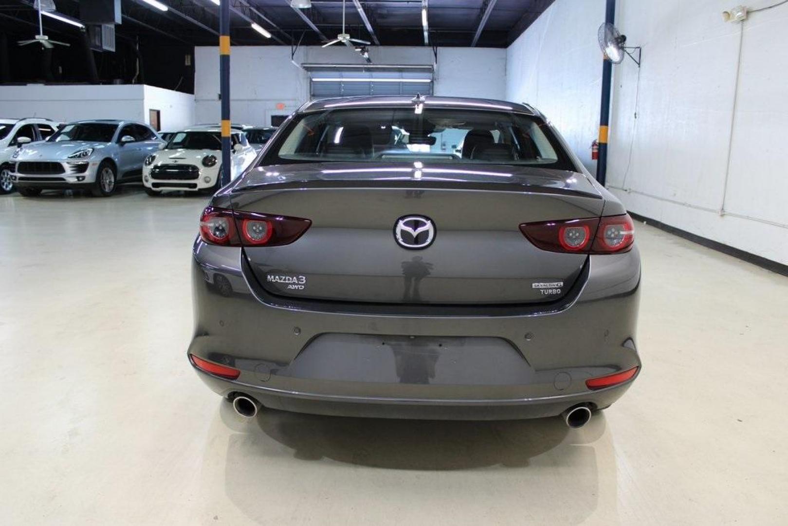 2021 Machine Gray Metallic /Black Mazda Mazda3 Premium Plus (JM1BPBEY9M1) with an I4 engine, Automatic transmission, located at 15300 Midway Rd., Addison, TX, 75001, (972) 702-0011, 32.958321, -96.838074 - HOME OF THE NO HAGGLE PRICE - WHOLESALE PRICES TO THE PUBLIC!! Mazda3 Premium Plus, 4D Sedan, I4, 6-Speed Automatic, AWD, Machine Gray Metallic, Black Leather.<br><br>Machine Gray Metallic 2021 Mazda Mazda3 Premium Plus<br><br>Recent Arrival! 23/32 City/Highway MPG<br><br><br>At Midway Auto Group, w - Photo#7