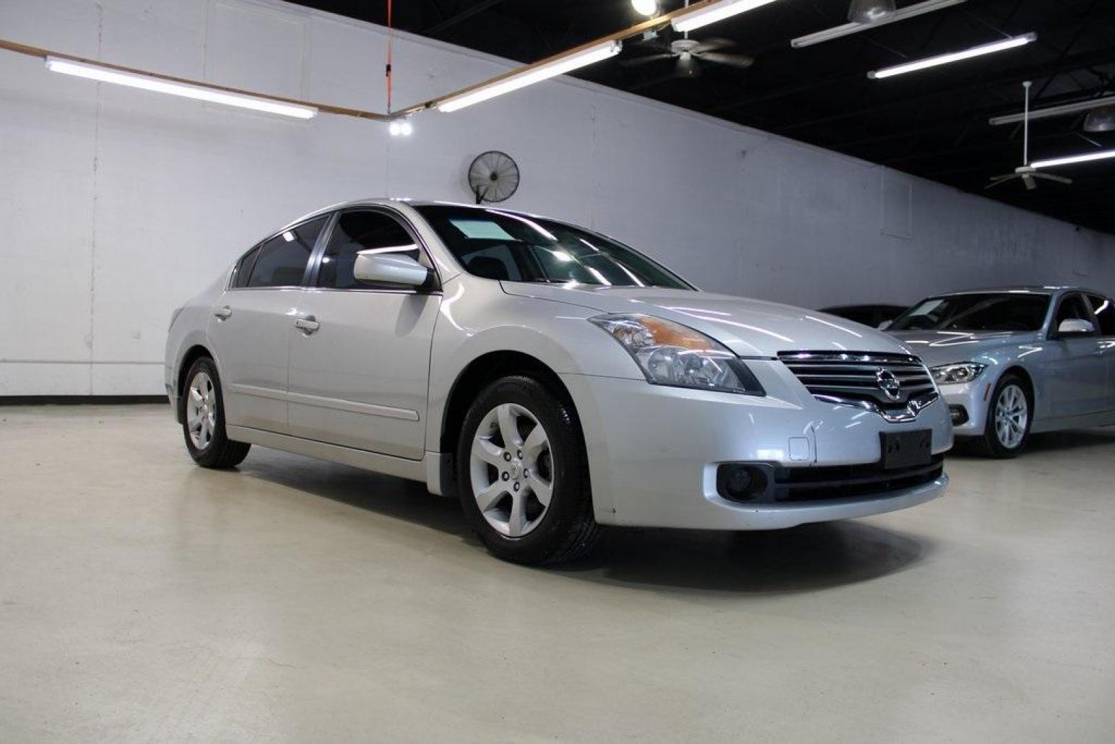 2008 Silver Lightning Metallic /Charcoal Nissan Altima 2.5 SL (1N4AL21E68N) with an 2.5L I4 SMPI DOHC engine, CVT transmission, located at 15300 Midway Rd., Addison, TX, 75001, (972) 702-0011, 32.958321, -96.838074 - HOME OF THE NO HAGGLE PRICE - WHOLESALE PRICES TO THE PUBLIC!! Altima 2.5 SL, 4D Sedan, 2.5L I4 SMPI DOHC, CVT, FWD, Silver Lightning Metallic, Charcoal w/Leather Appointed Seats.<br><br>Silver Lightning Metallic 2008 Nissan Altima 2.5 SL<br><br>23/31 City/Highway MPG<br><br><br>At Midway Auto Group - Photo#1